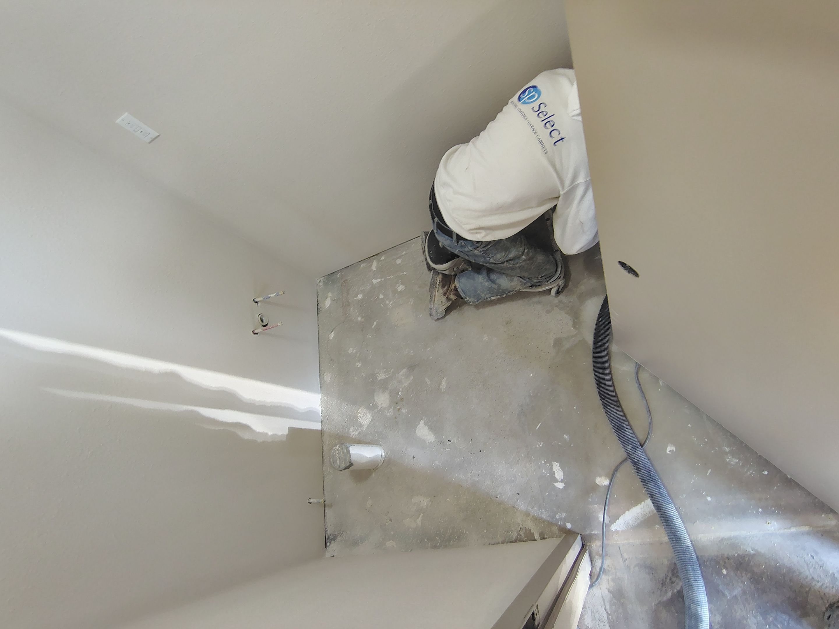 Durable Epoxy Flake Floor Coating for Commercial Workshop by Select Painting, Coatings & Garage Cabinets