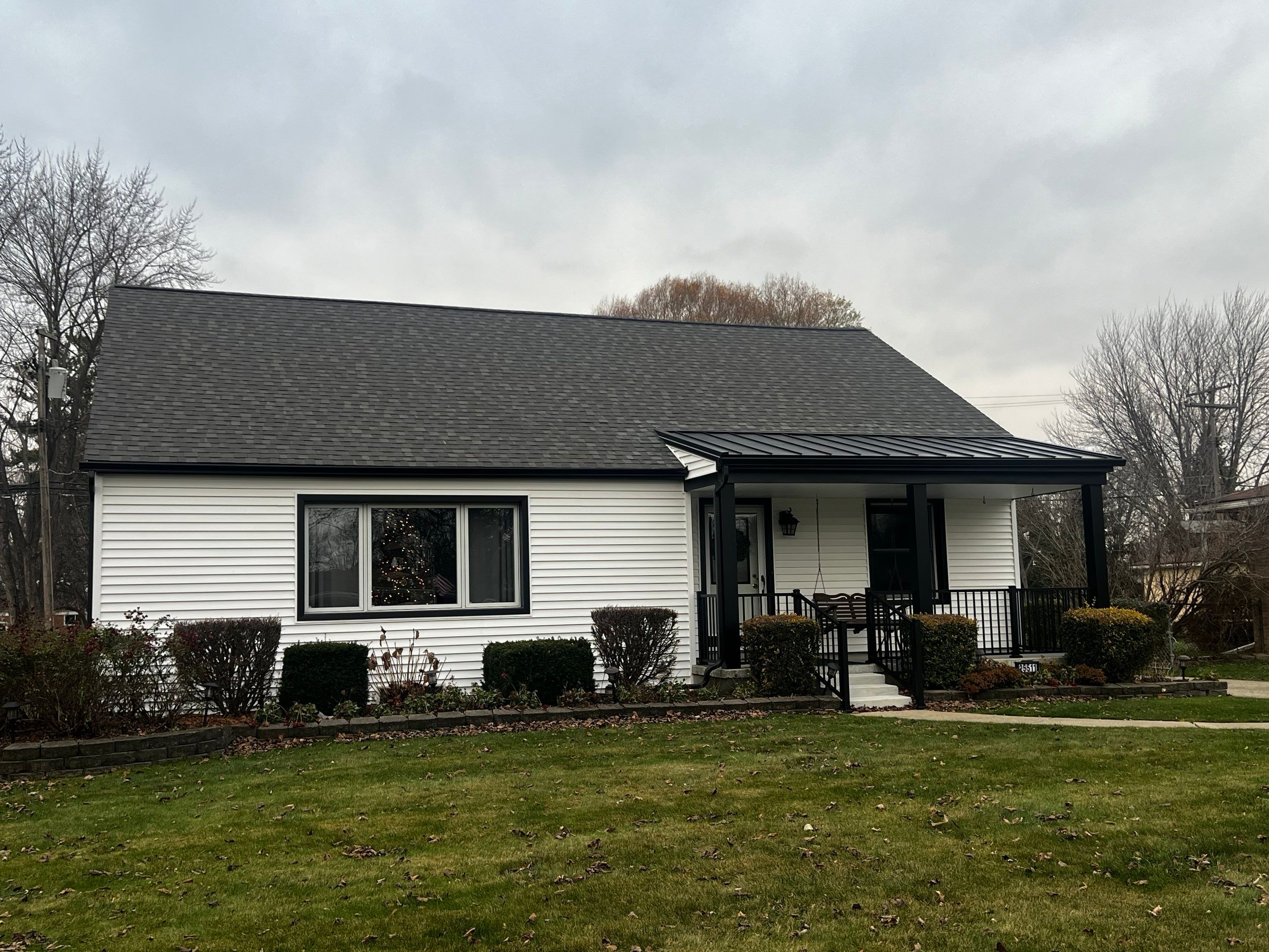 Siding Replacement using CertainTeed Monogram vinyl in Colonial White & Front Porch Remodel by Bloomfield Construction & Restoration