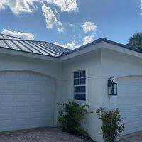 24ga 1.5" Mechanical Seam Matte Black by Total Roofing System The Metal Roof Experts