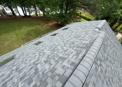 Residential Roof Replacement with Owens Corning Duration Architectural Shingles and 5 Velux Skylights in Charlotte, North Carolina