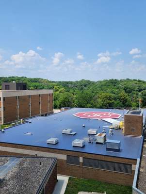 Commercial Roofing Installation using Charcoal DURO LAST