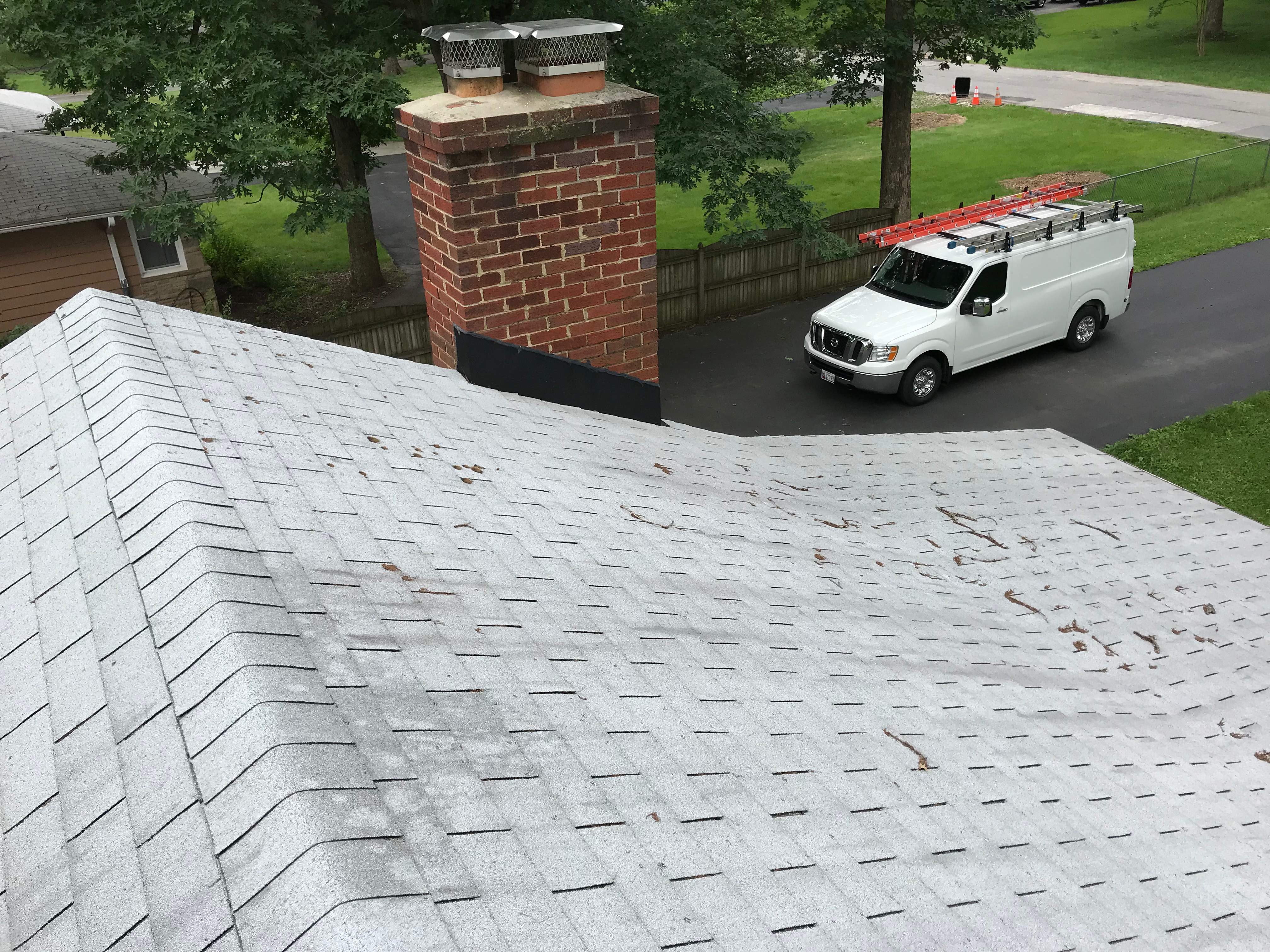 Residential Roofing Installation using Charcoal Black by Alpha Design Services