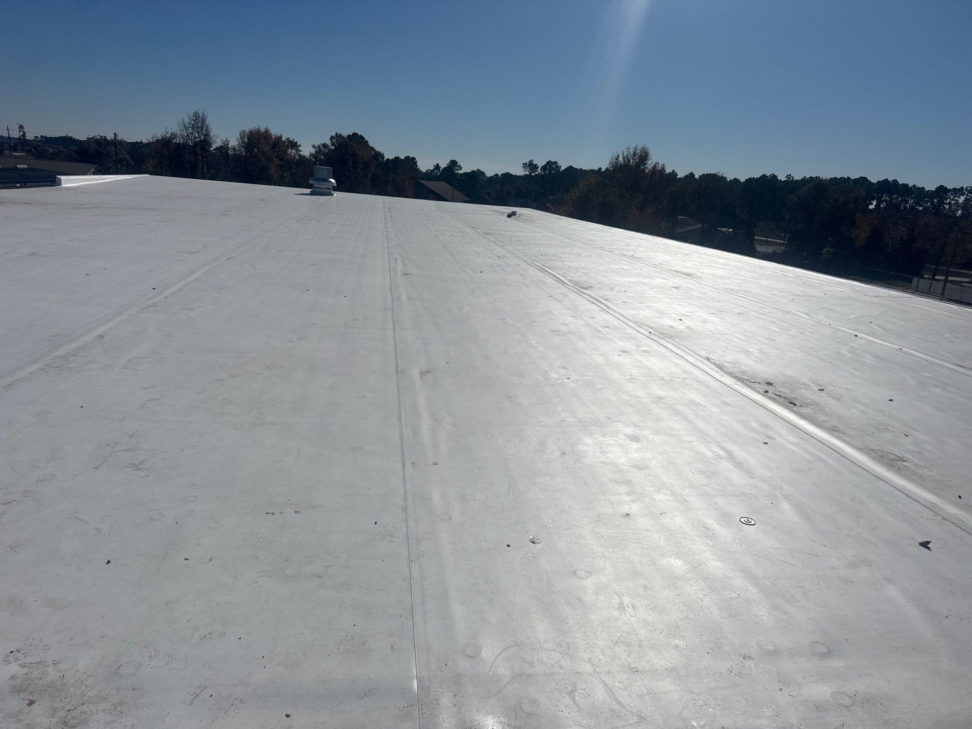 Commercial Roof Replacement using Carlisle Sureweld TPO at Ferguson Plumbing by Roof Experts