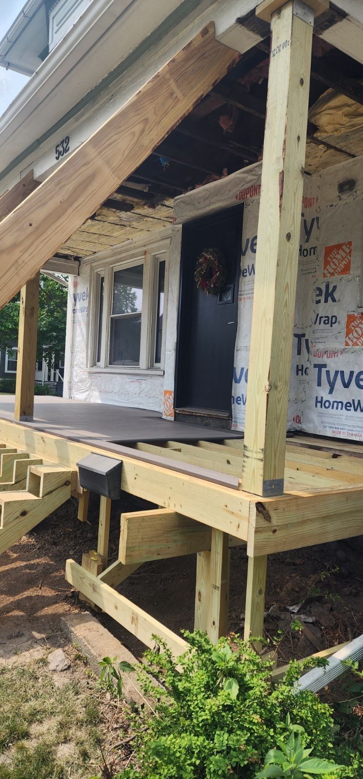 Exterior Renovations- Siding, Stamped Concrete, Porch, and Railings by Ivy Lea Construction