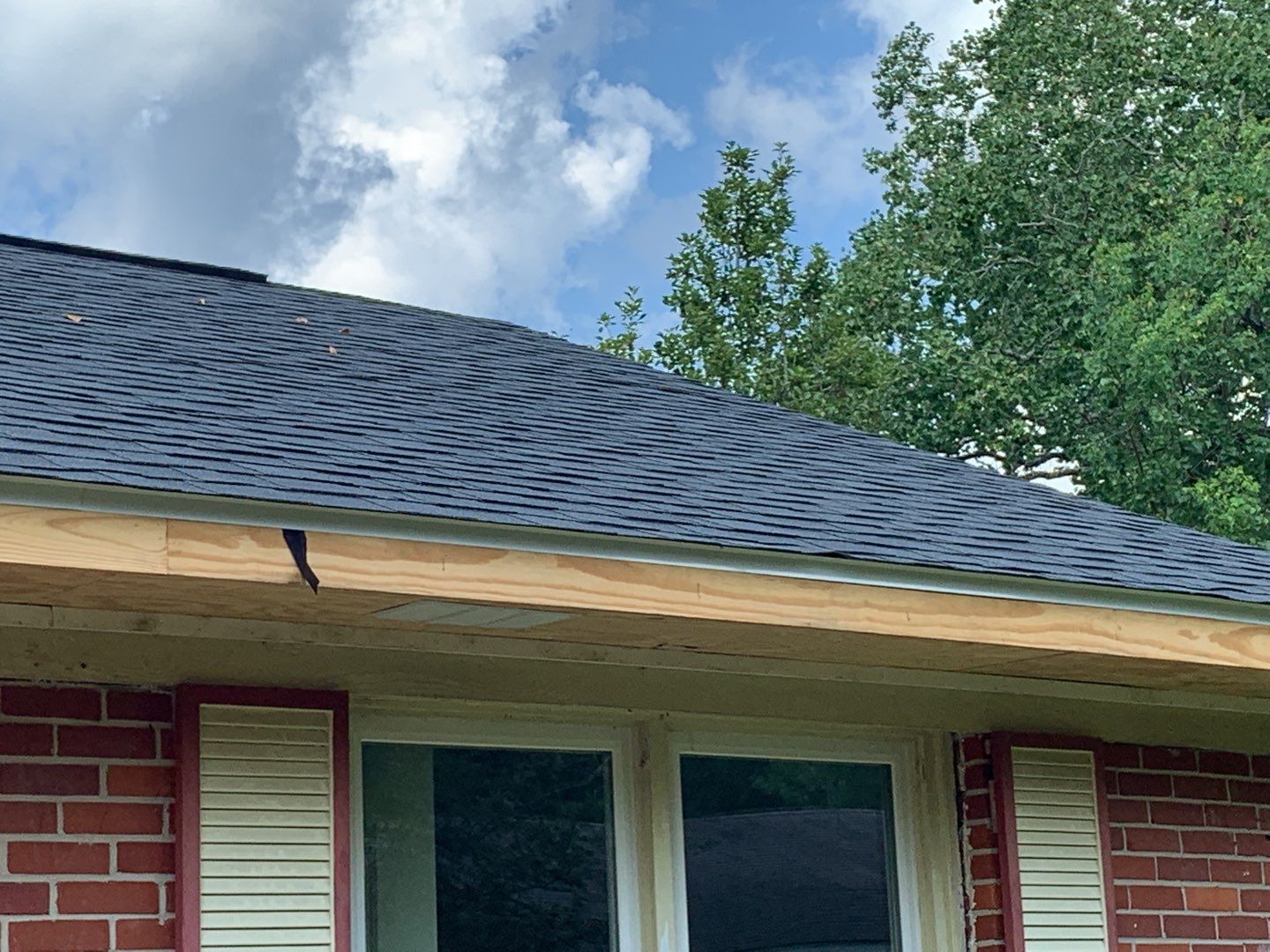 Residential Roofing Installation using Roof Replacement by American Roofing & Construction LLC