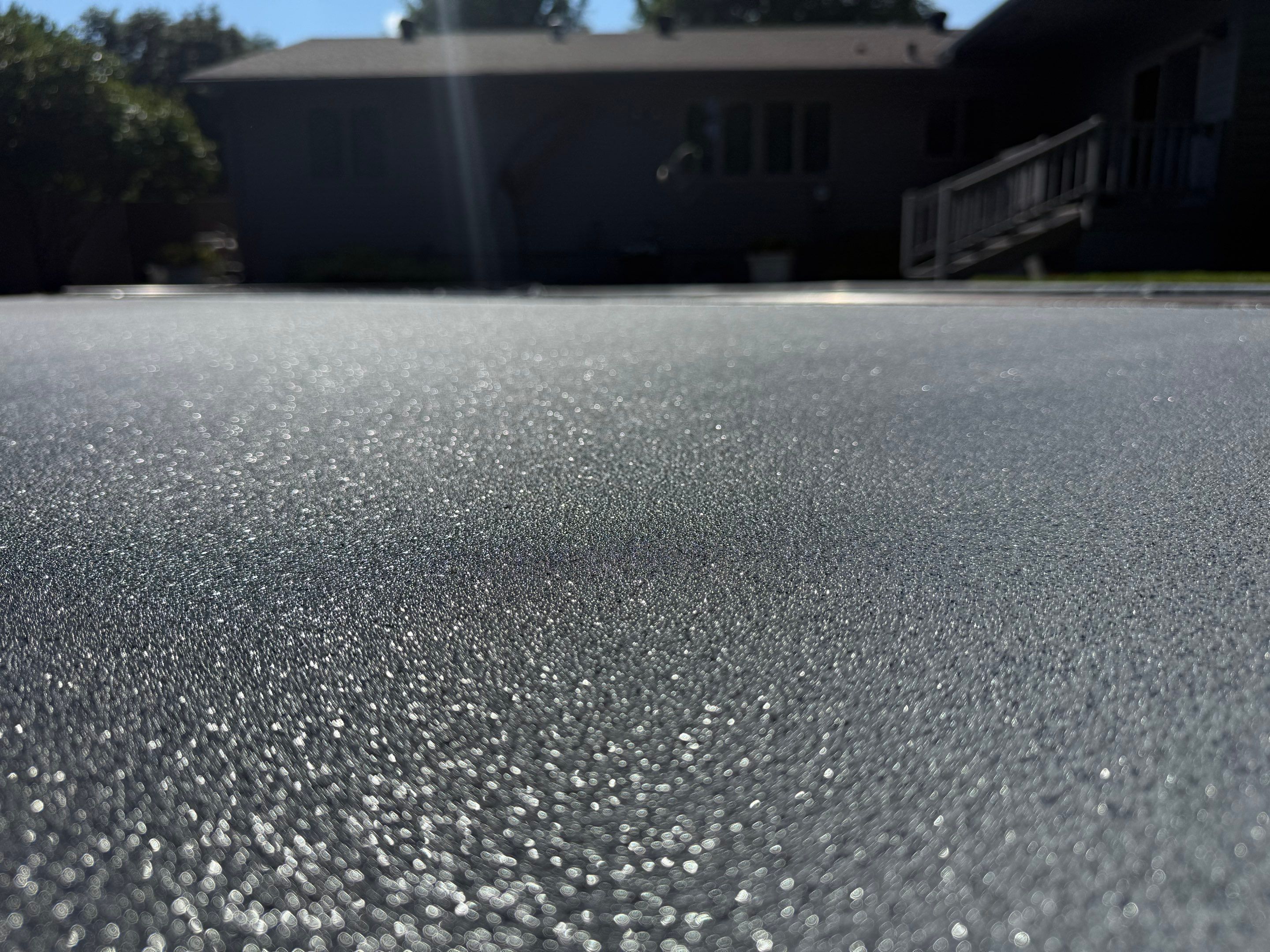 Residential Pool Deck Resurfacing in Sioux Falls by Select Painting, Coatings & Garage Cabinets