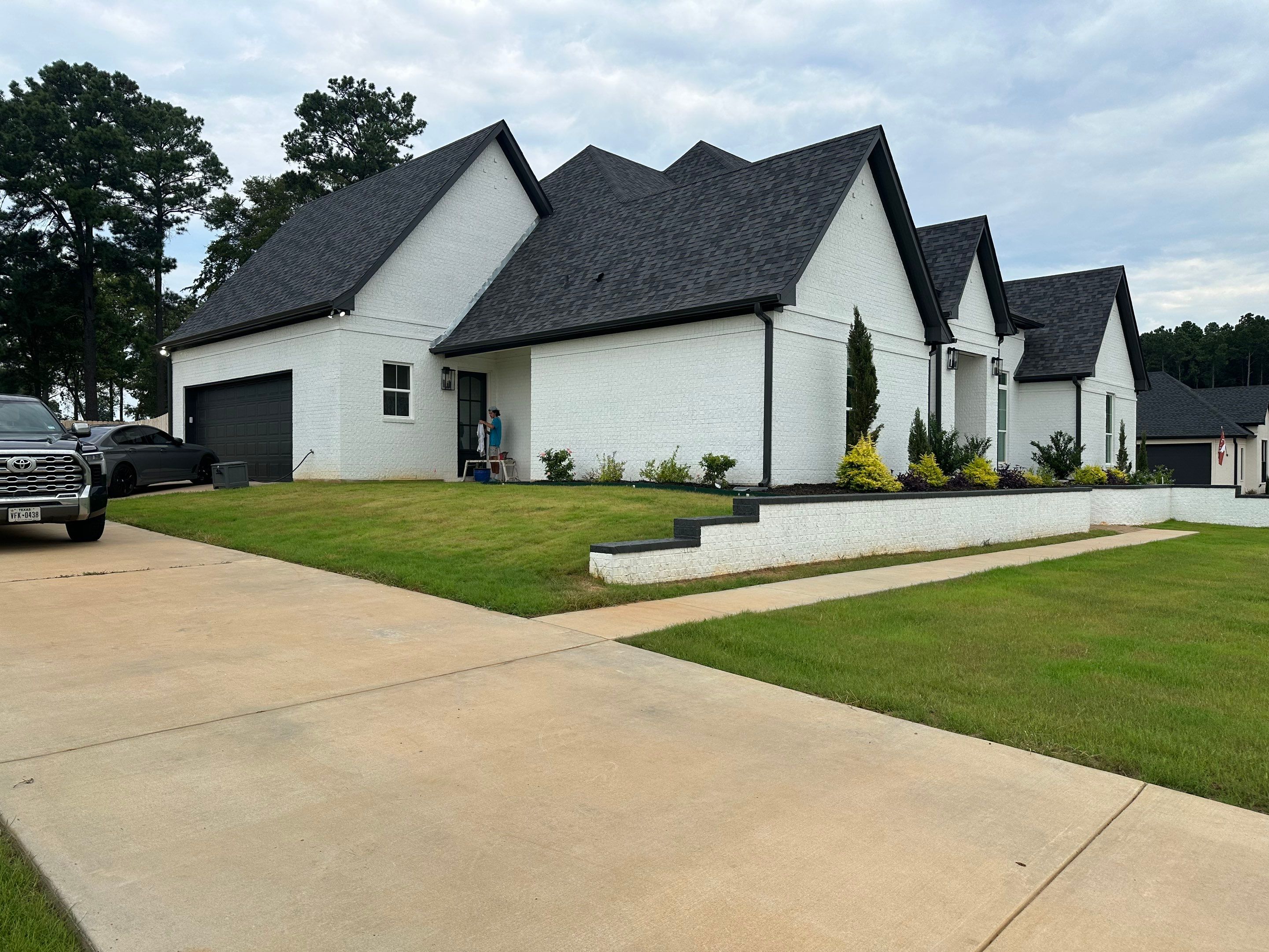 Exterior Painting in Longview, TX | Roof & Eaves in Elegant Black by Quality Coats Painting