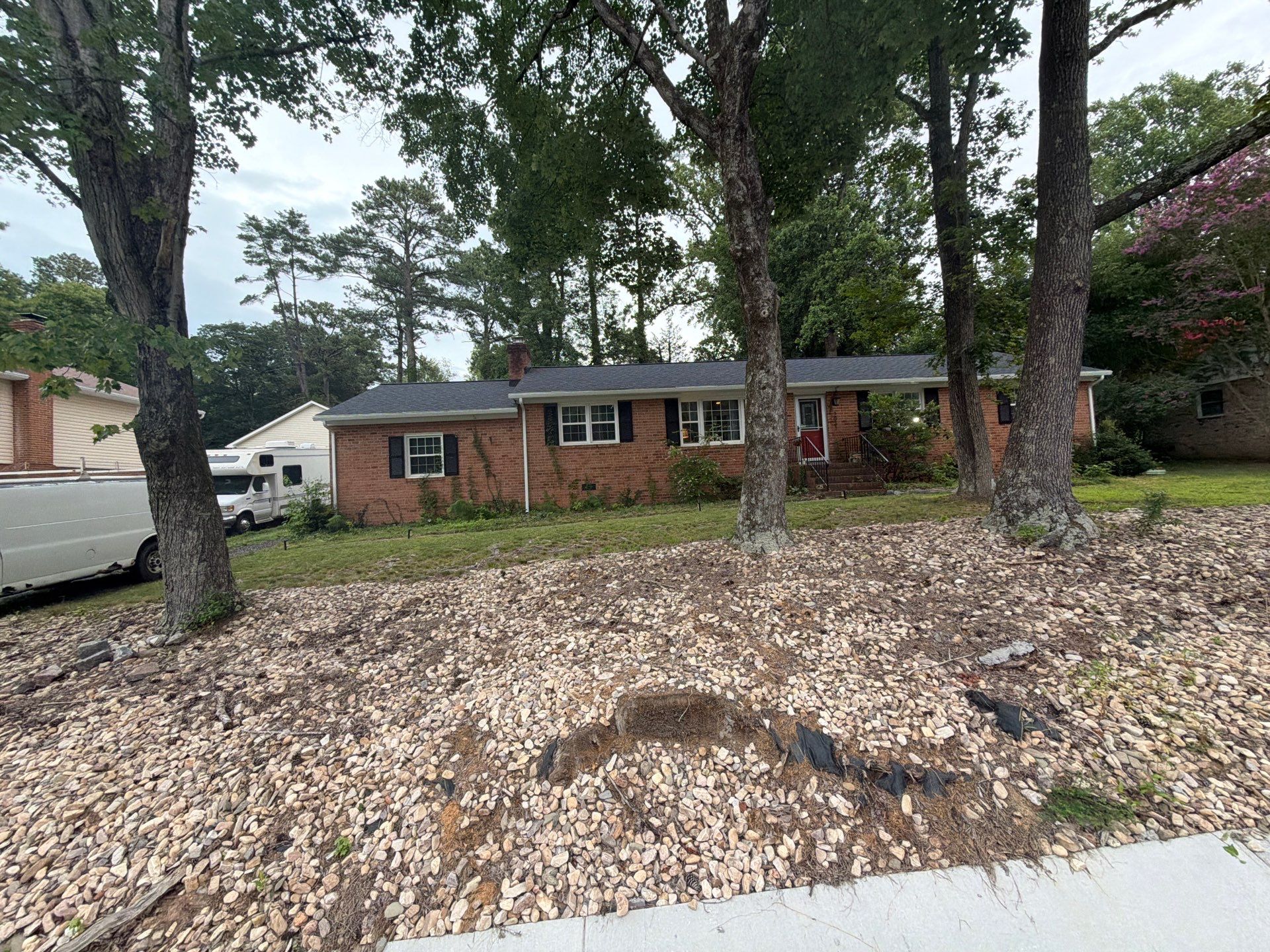 Asphalt Shingle Roof Replacement and Gutter Installation in Richmond by Cade Construction