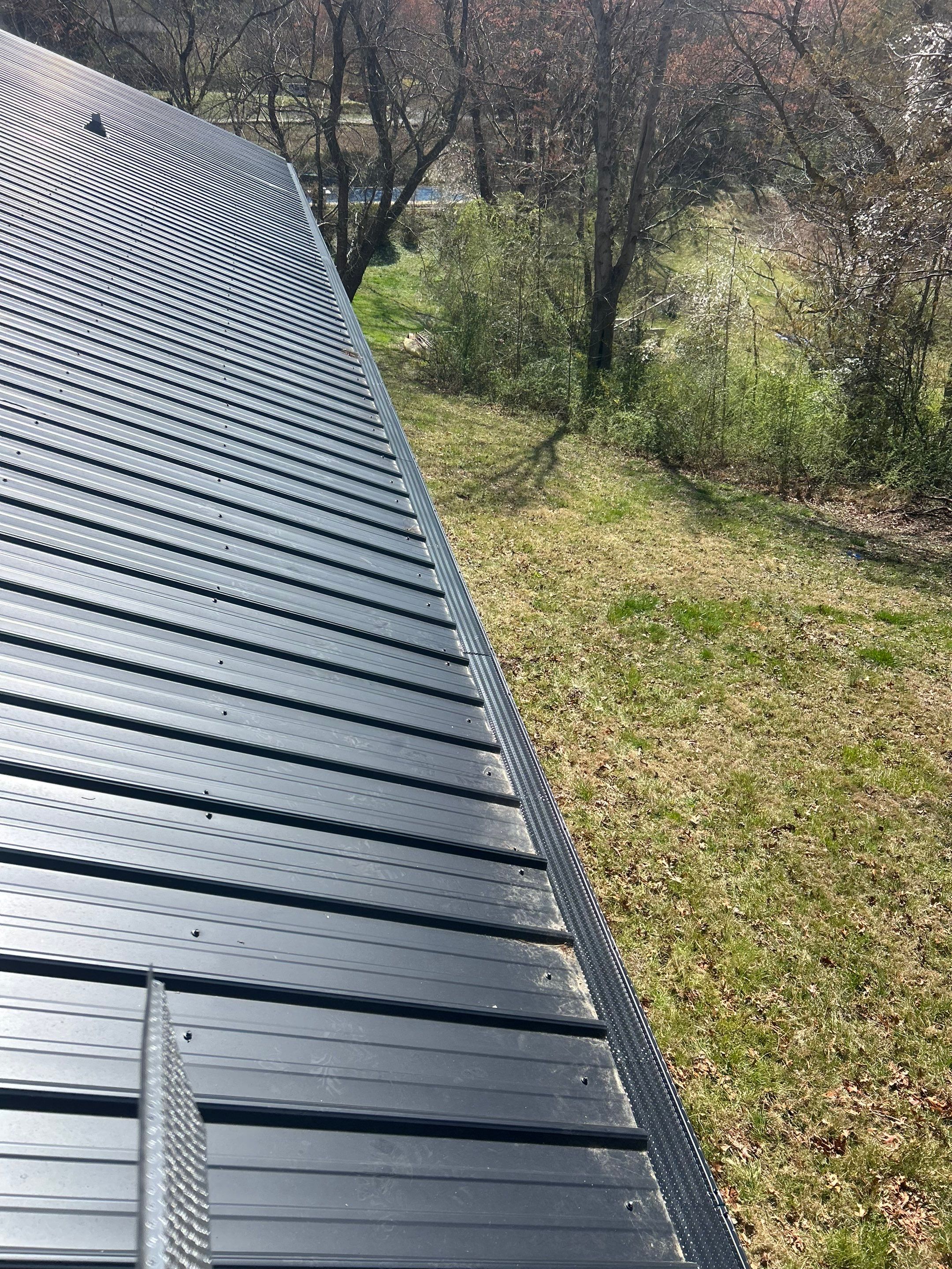 6" Black Gutters and Guards by Peak 2 Peak Services LLC