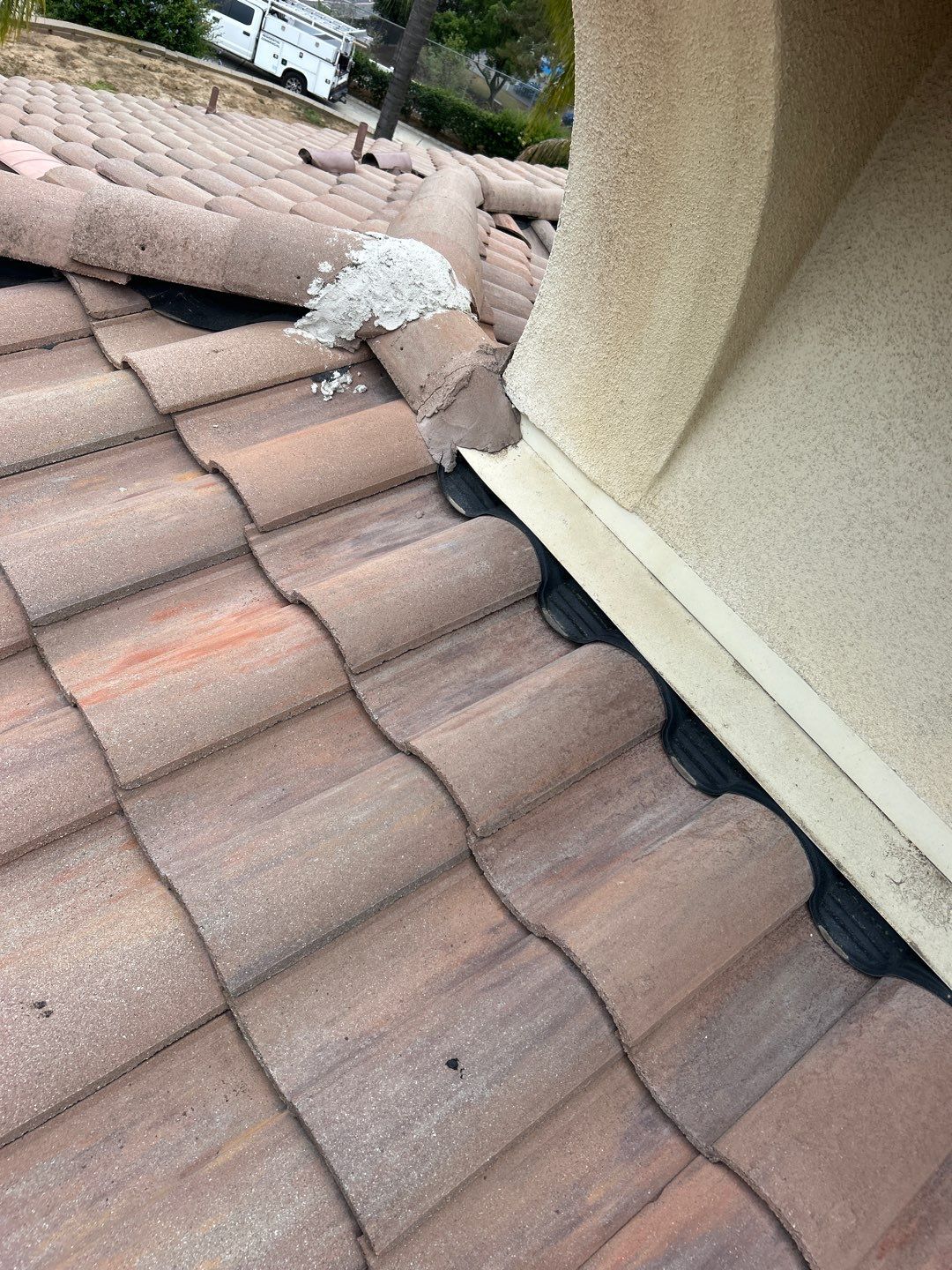 Terracotta Tile Roof Repair and Ridge Cap Sealing in Escondido by Reliable Roofing San Diego Inc.
