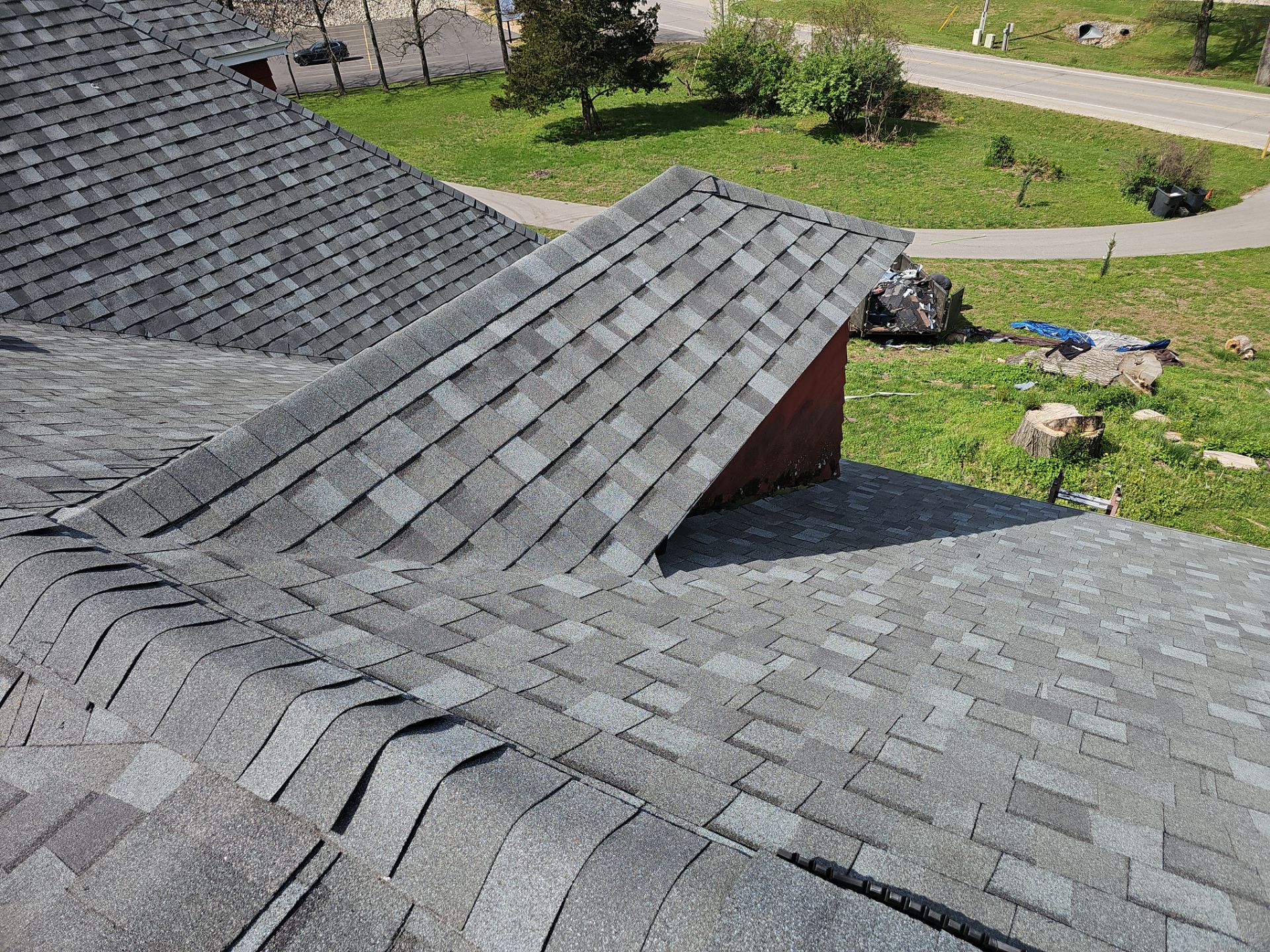 Residential Roof + Gutters & Downspouts Install  by Titan Commercial & Residential Roofing 