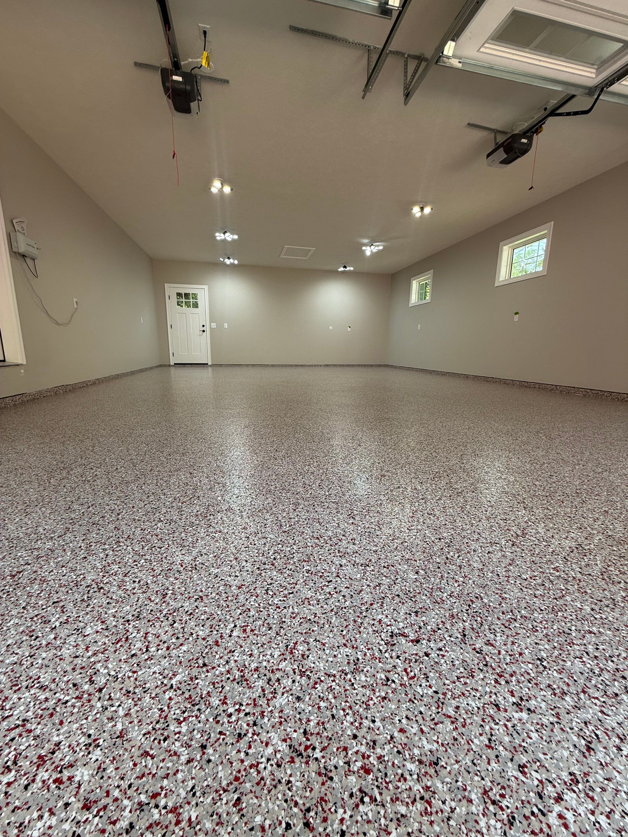 GO BIG RED: Custom Flake Epoxy Garage Floor in Lincoln by Goat Coatings