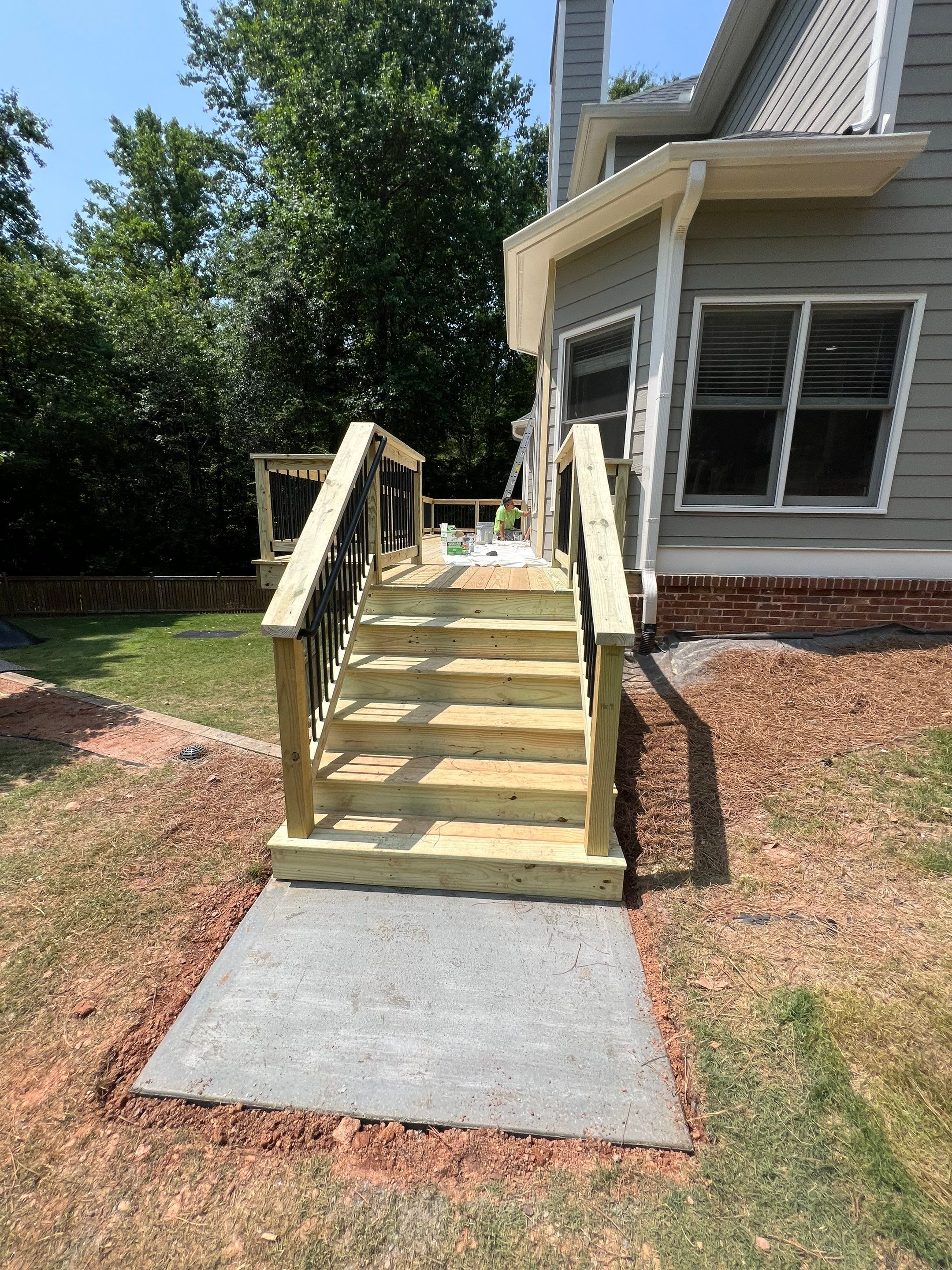 Elevated Wood Deck Replacement and Staircase Installation in Woodstock by Swift Home Renovations