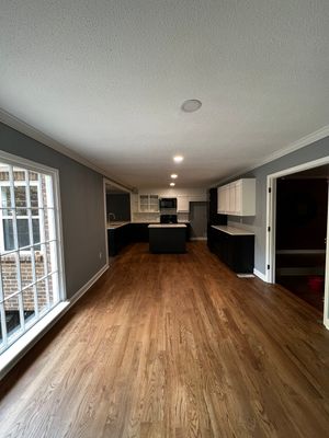 Kitchen and Living Area Renovation Featuring Hardwood Flooring in Smyrna