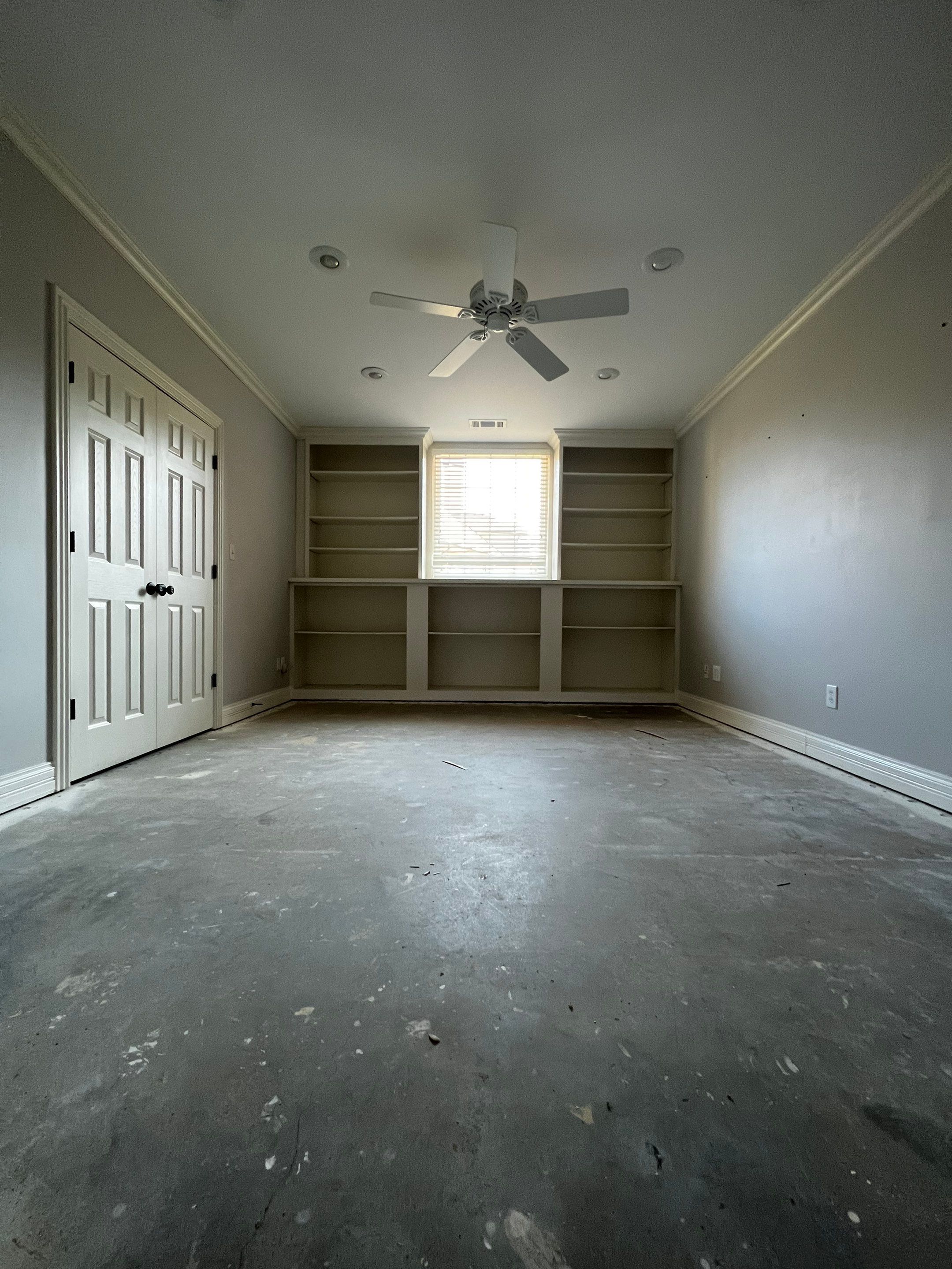 Finished Basement Remodeling with Dark Wood-Look Flooring and Custom Wainscoting by Swift Home Renovations 