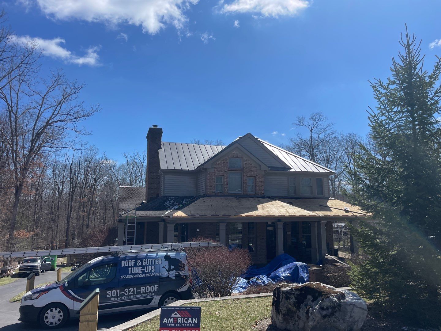 Metal Roof Replacement  by American Home Contractors