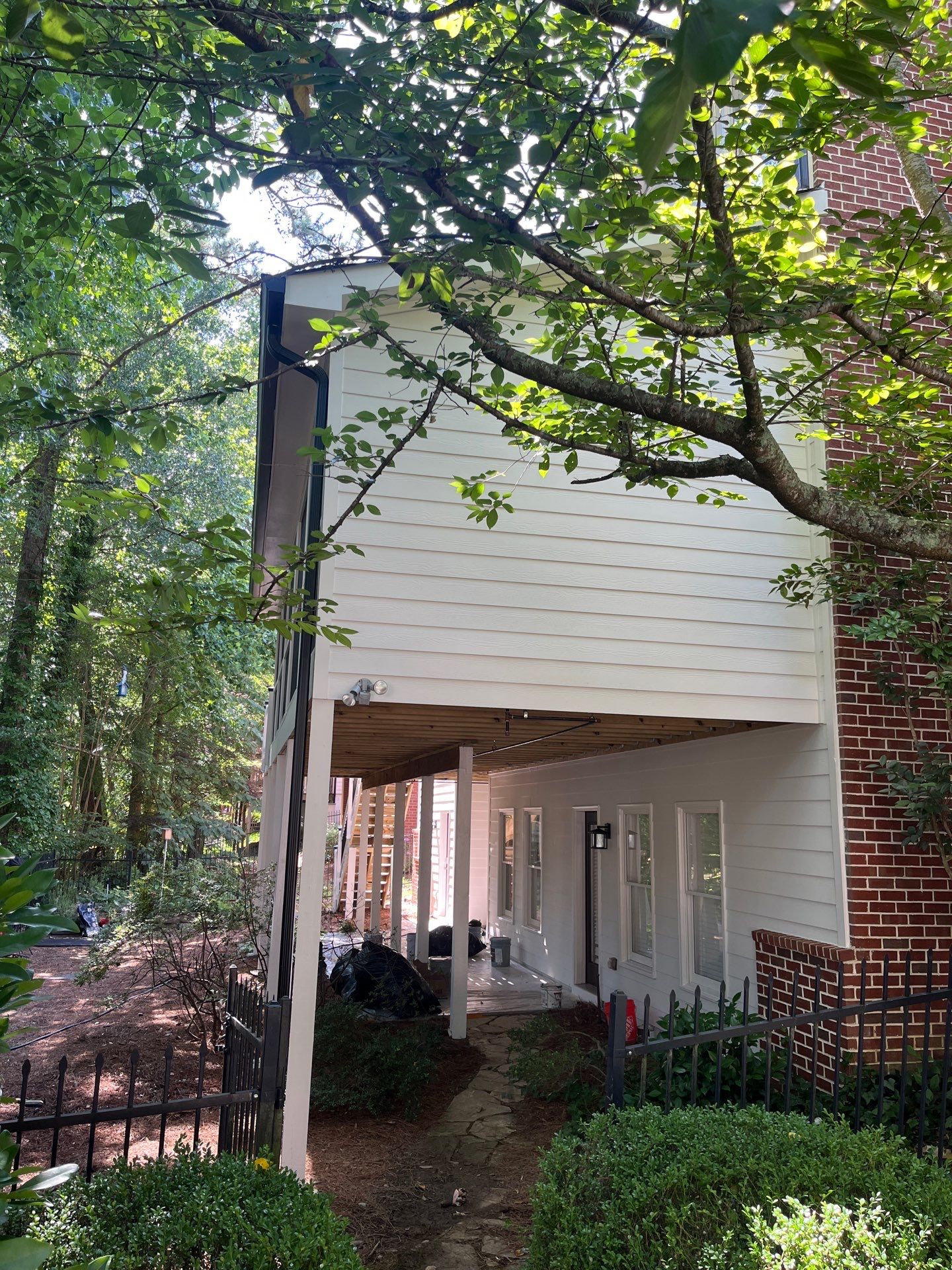 Deck Stain and Rotten Wood Replacement with James Hardie and Sherwin-Williams Products by Nelson Exteriors 