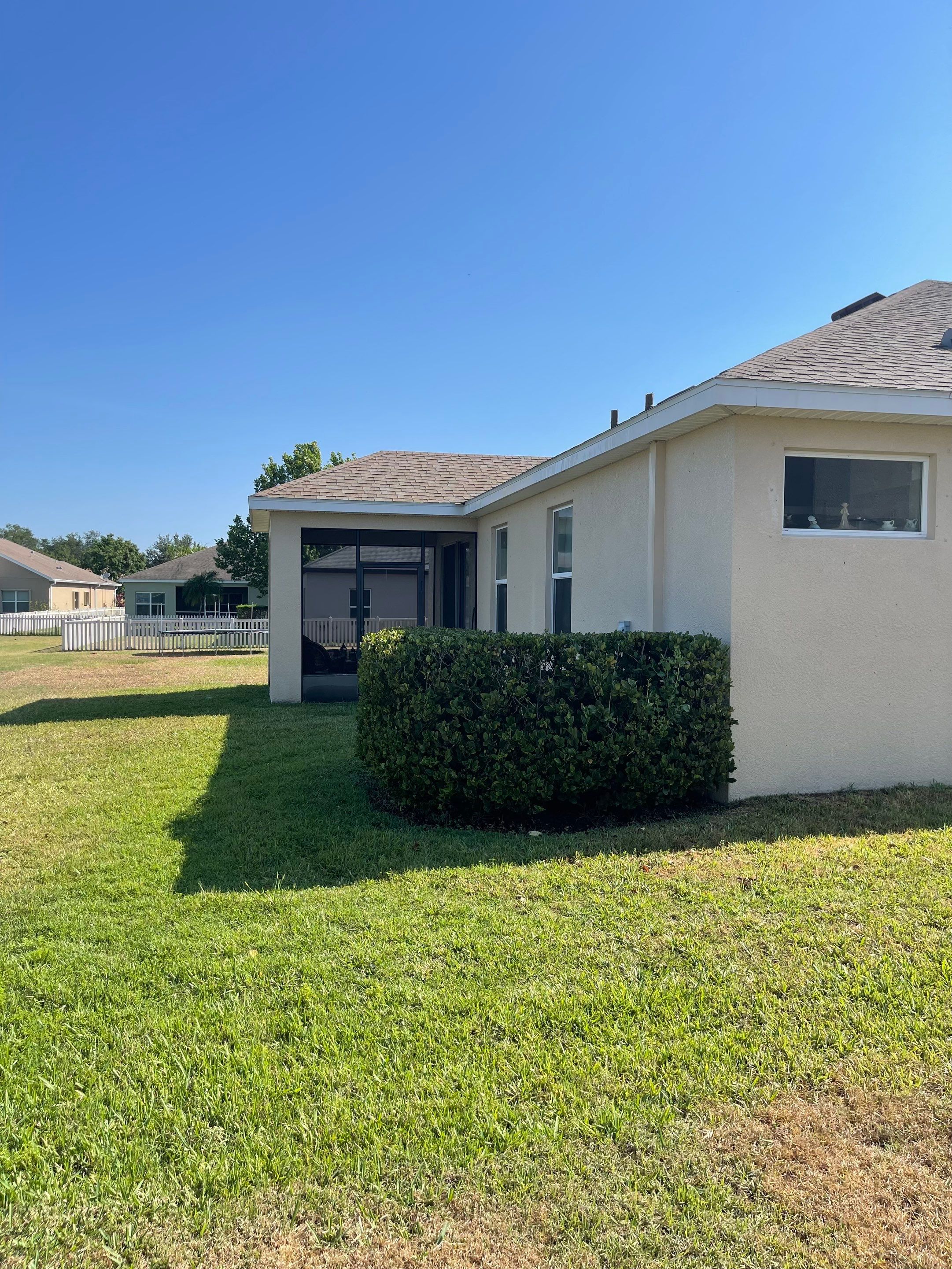 Asphalt Shingle Roof Soft Wash Cleaning & Concrete Pressure Washing in CopperStone Community, Parrish, FL by Sunshine AquaWash