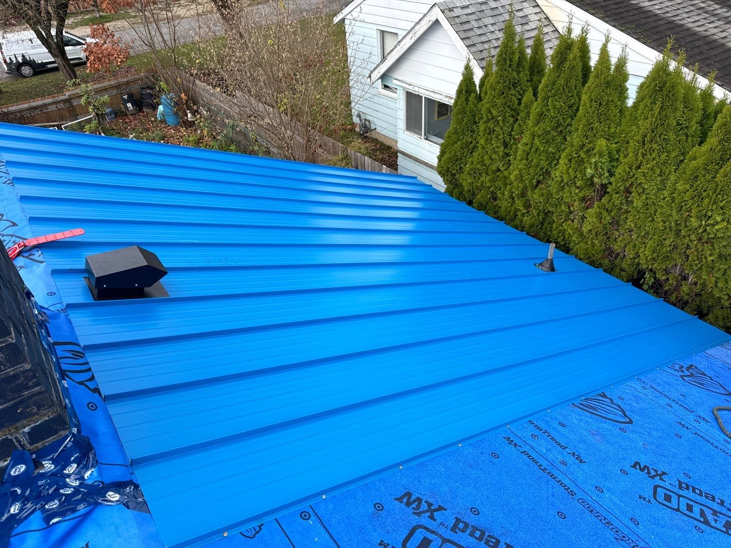 Residential Re-Roof using 12" Prolok metal  by Top Notch Roofing Inc
