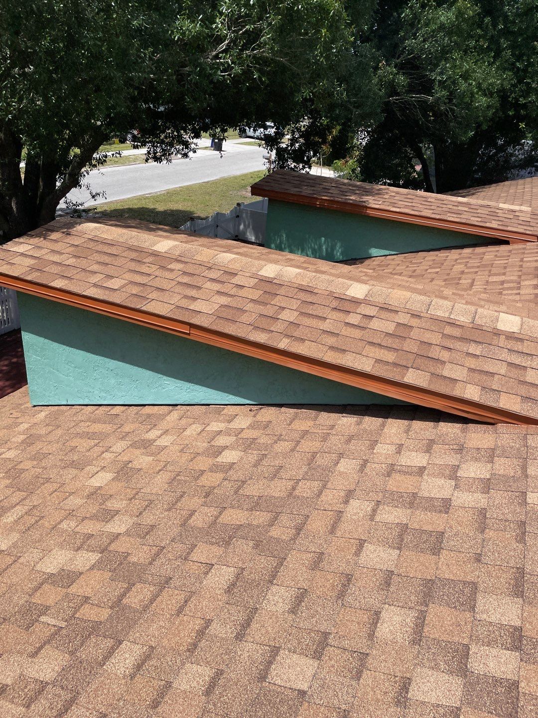 Orlando Residential ReRoof Using Dimensional Shingles and Flat Roof Transitions by Tip Top Roofing Co., Inc.