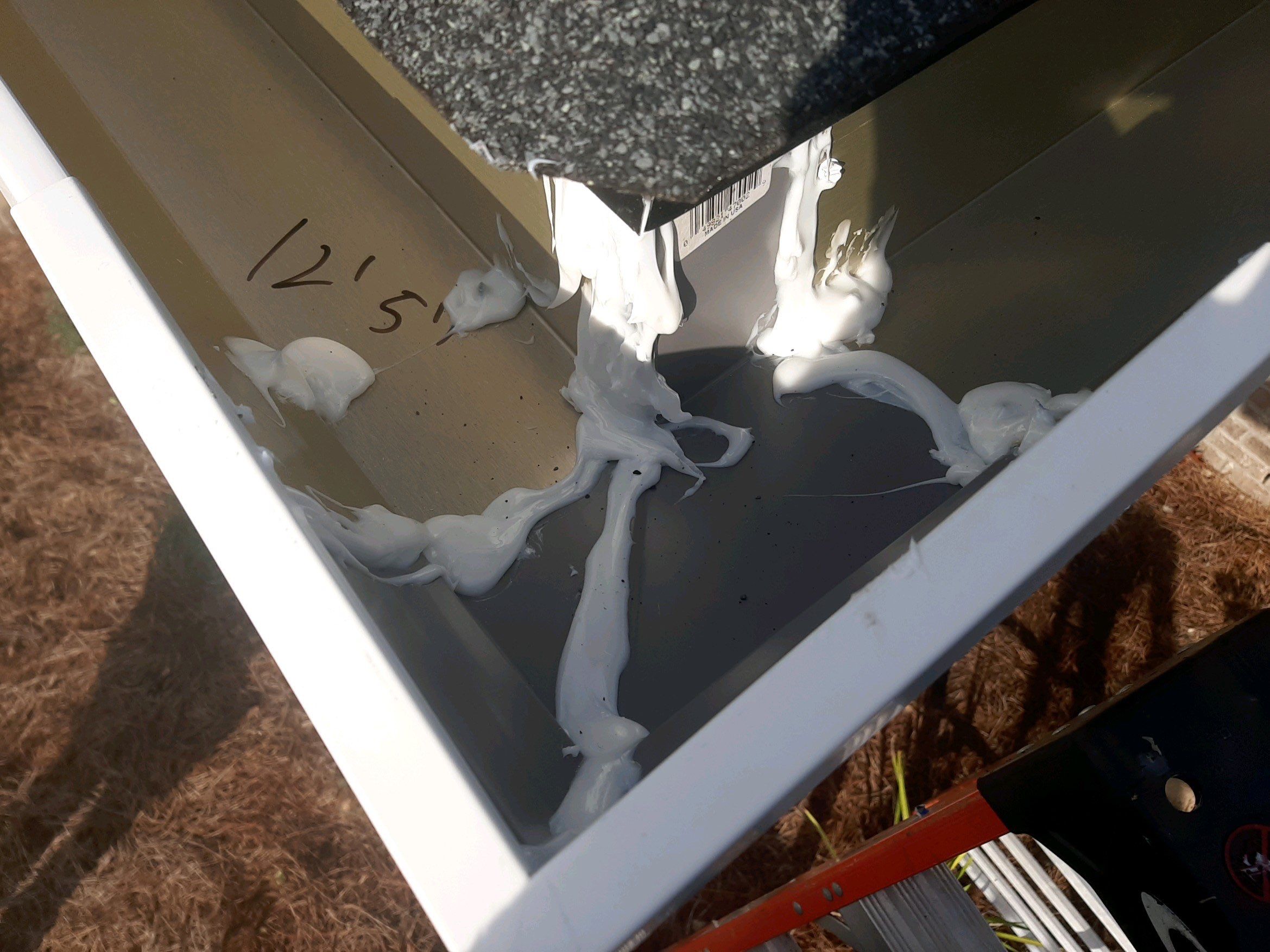 Seamless Gutter Installation Using White K-Style Gutters by Gutter Professors