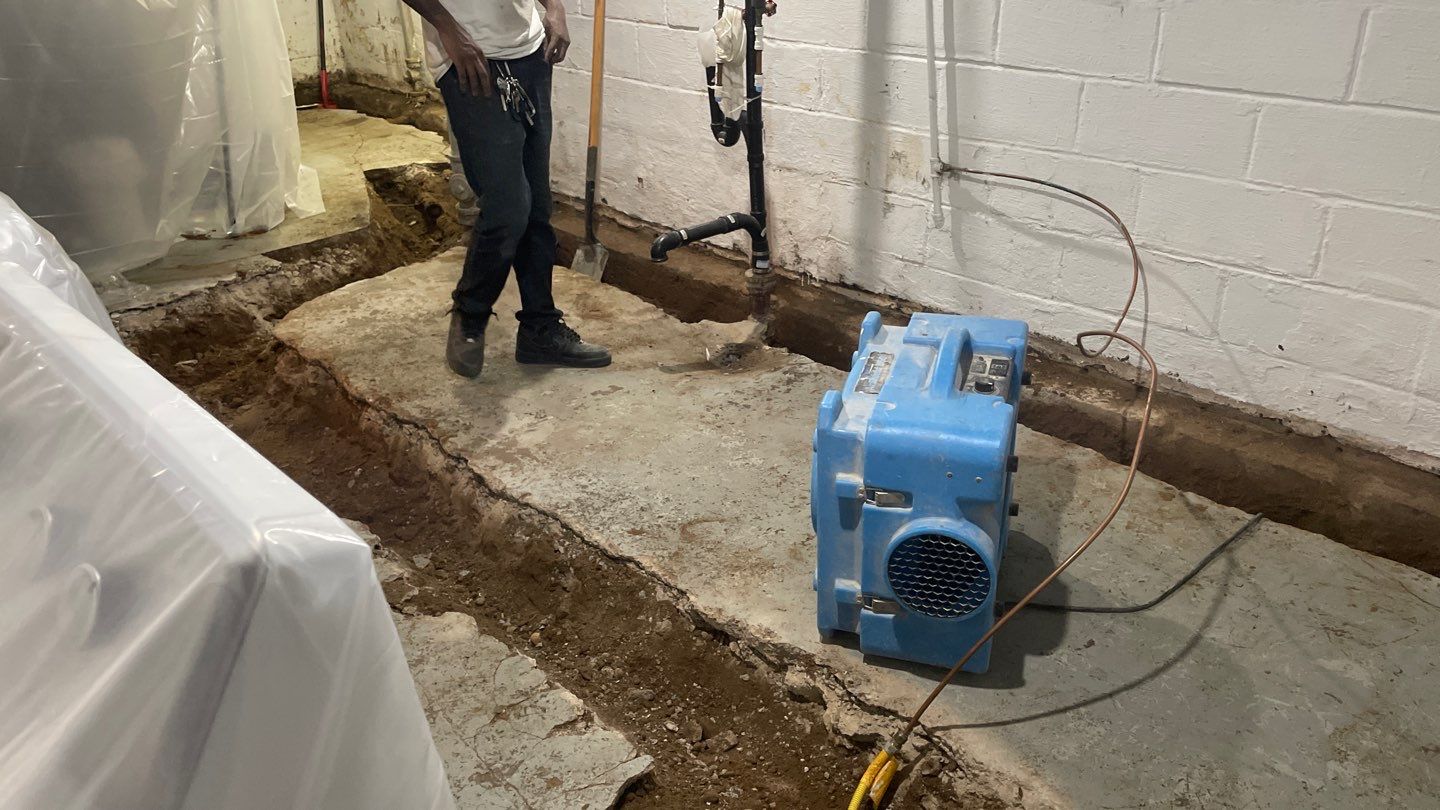 Interior Drain Tile & Yard French Drain in St. Paul, MN by Waterproofing Northeast