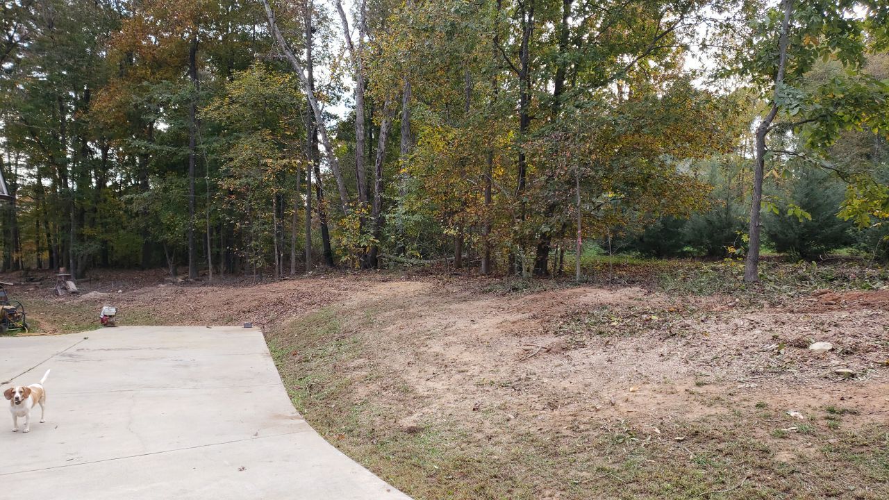 land clearing using machinery by Power Wash Masters LLC