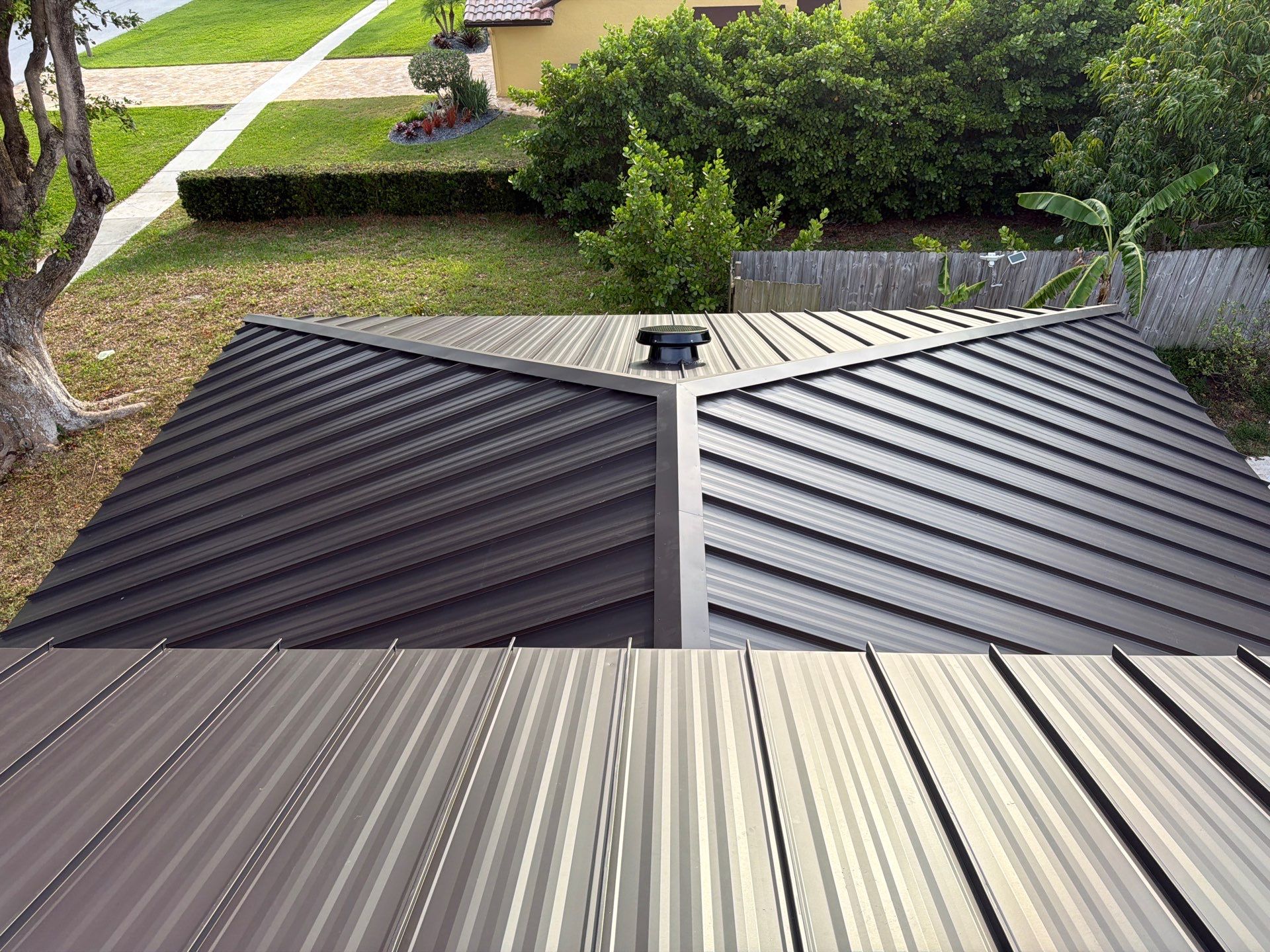 Residential Roofing Installation using 1.5'' Mechanical Seam by BLUES BROTHERS ROOFING