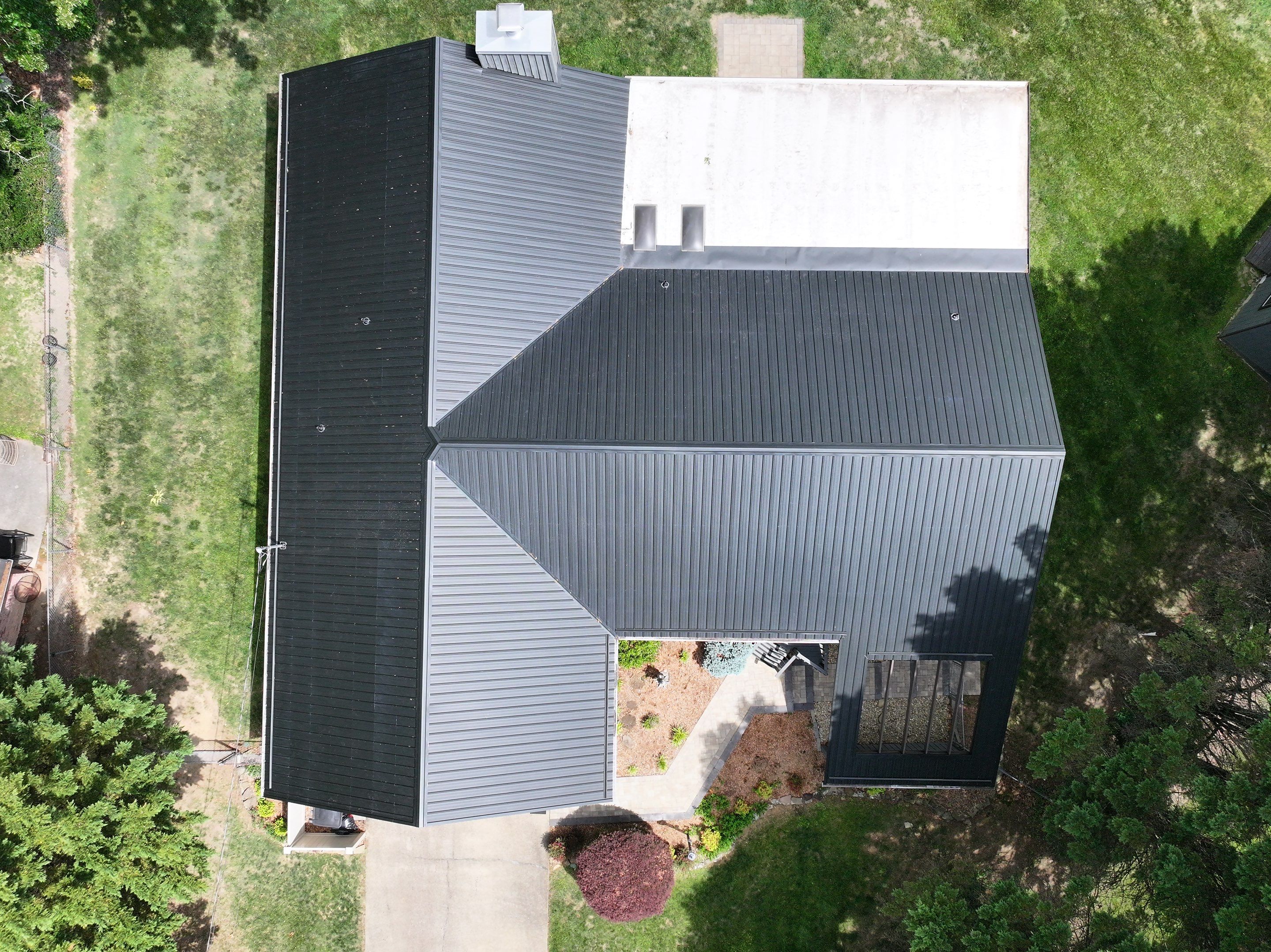 Miles Residence by Omnia Roofing