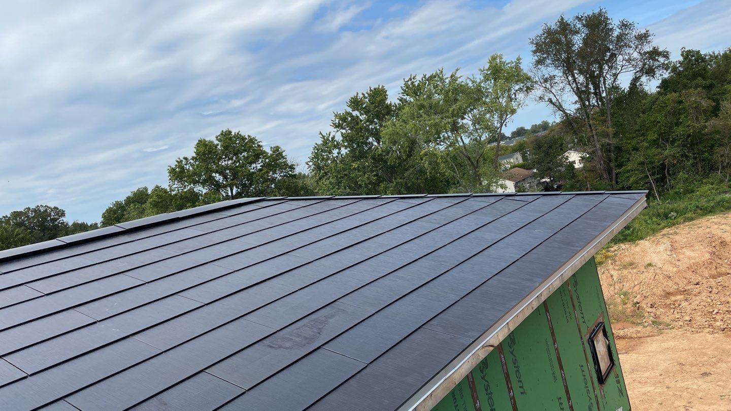 Tesla Solar Roof  using Tesla Solar Roof V3 tiles by American Home Contractors