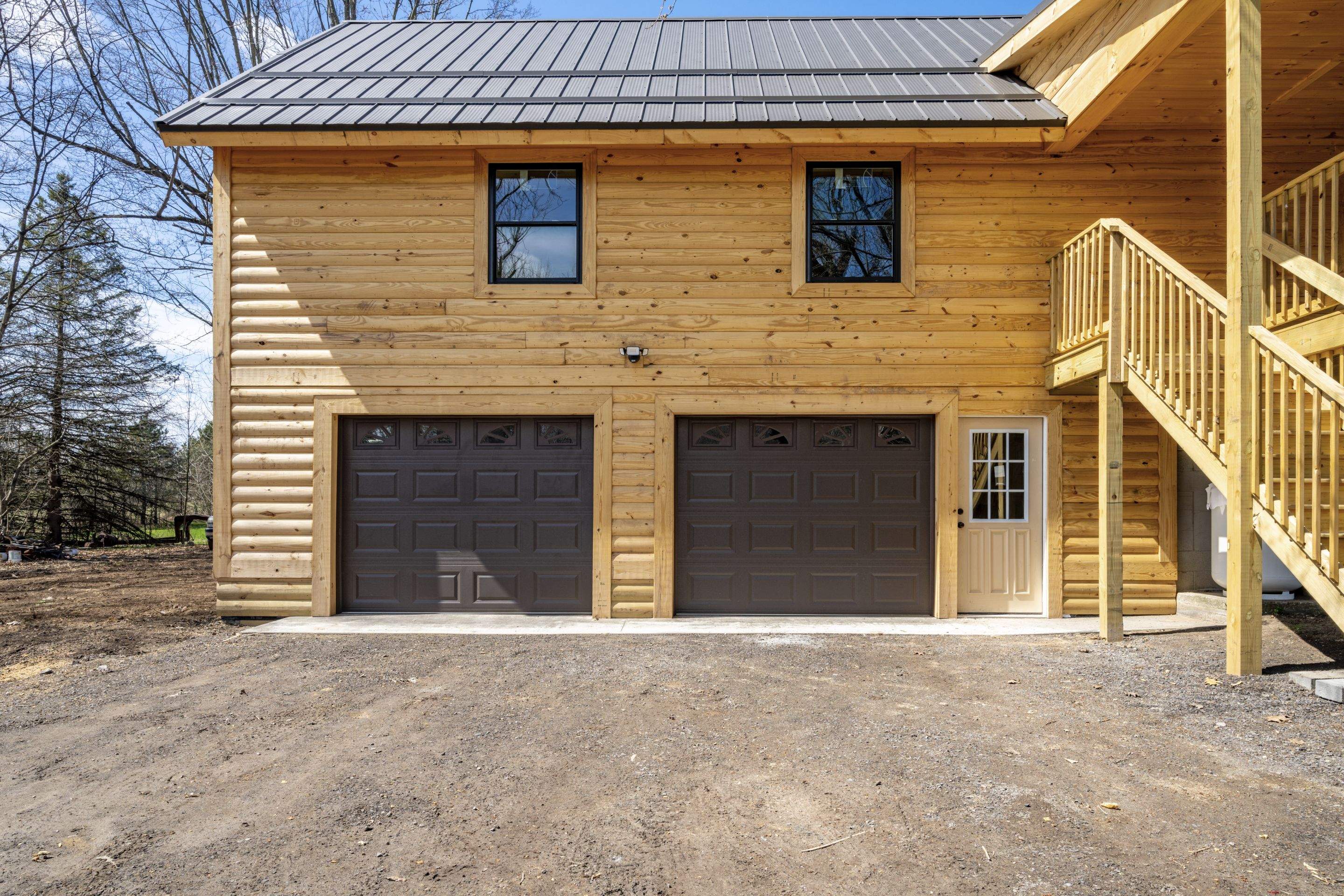 New Addition to Home using Log Cabin Siding  by Horst Custom Homes 