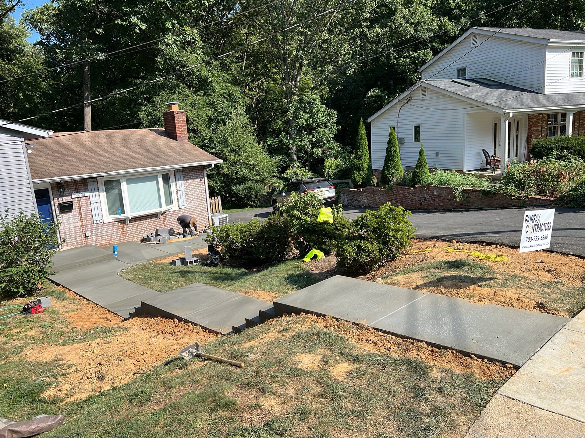 New walkway with stairs and a new front porch by Fairfax Contractors, LLC