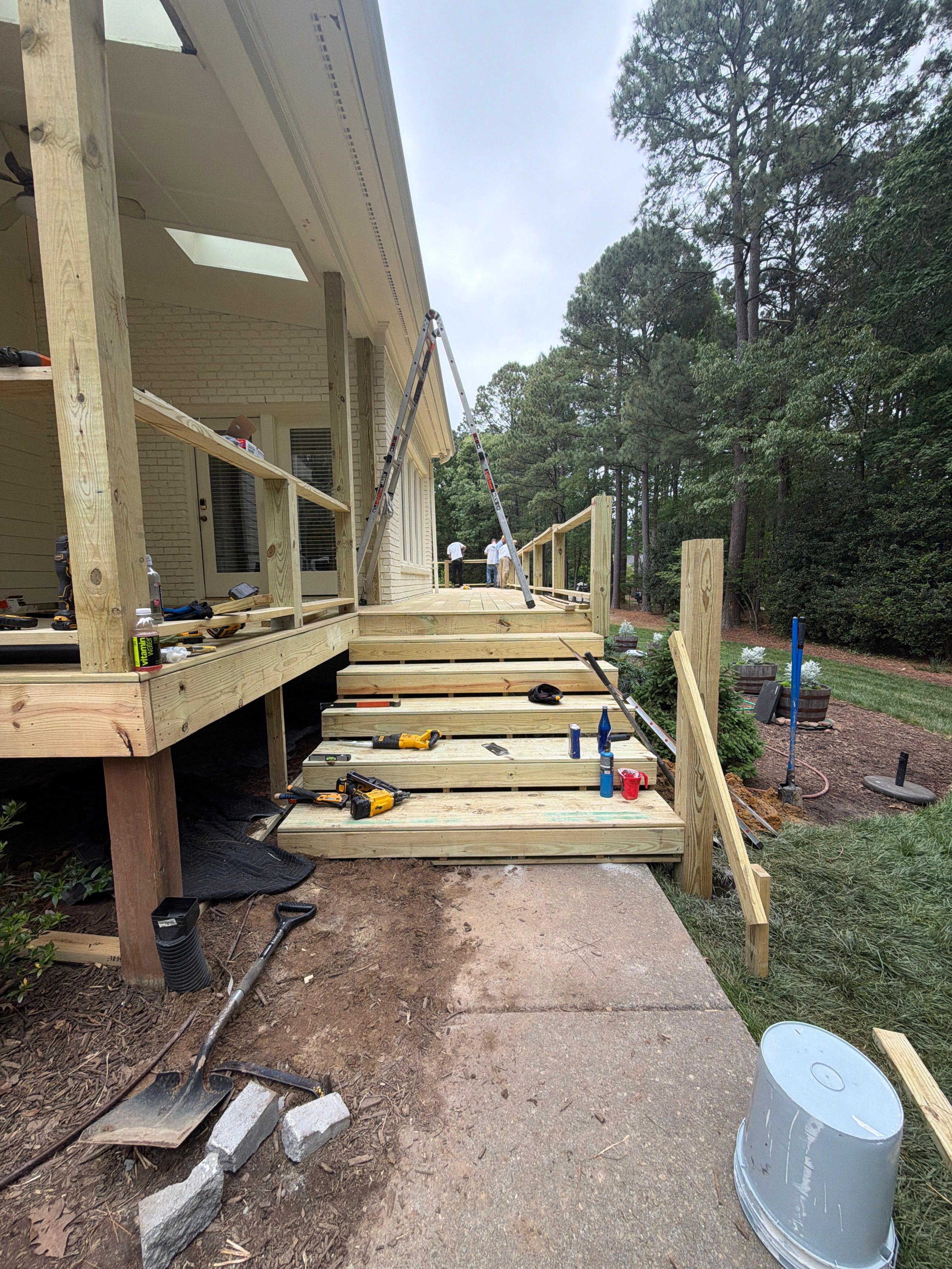 Deck Stain, Round Balusters & Screened Porch Transformation by Billy Weatherspoon Contractor