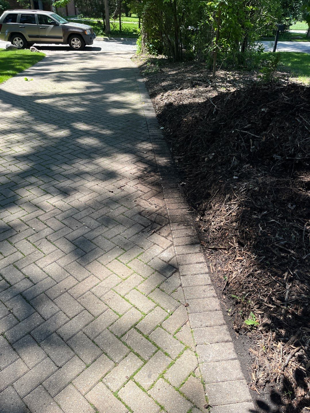 Brick paver repair, cleaning and sealing by Northern Power Washing LLC.