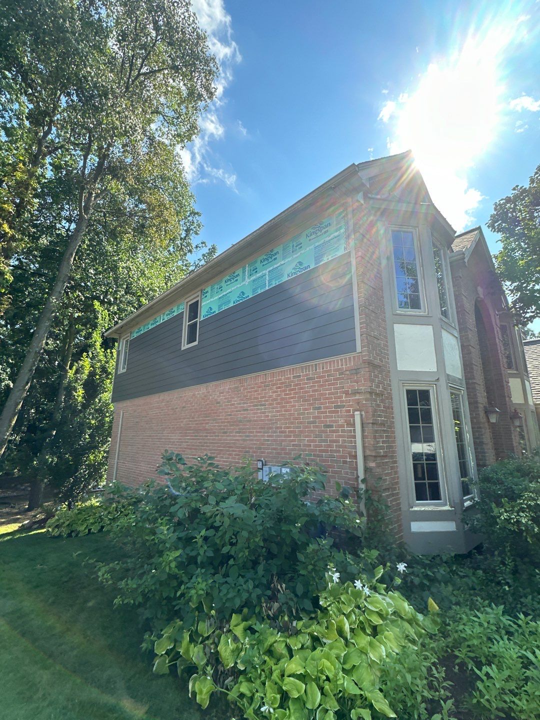 Roof Replacement using Owens Corning Peppercorn and Siding Replacement using Ascend Charcoal Smoke by 180 Contractors