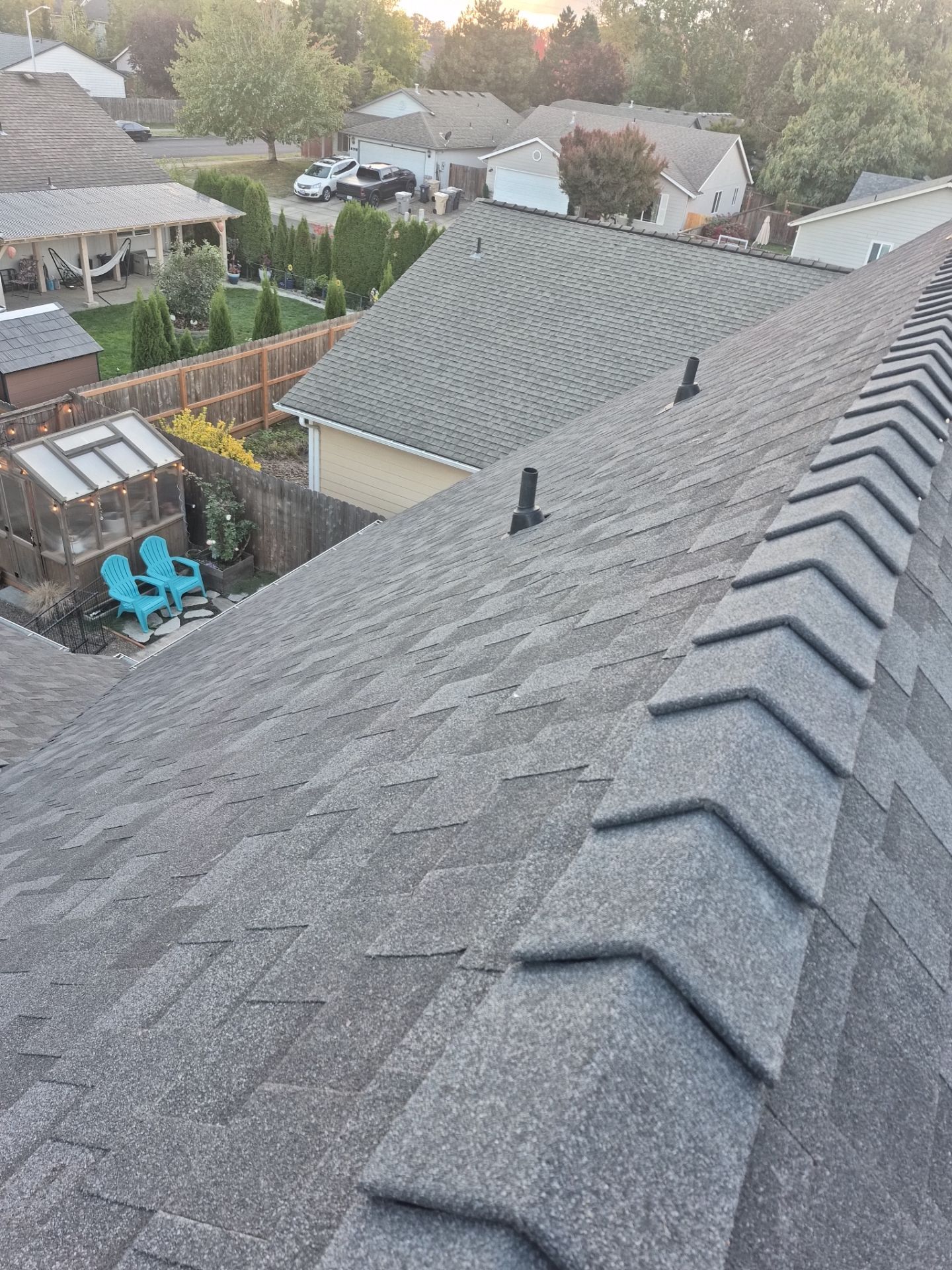 Granite Black Residential Roof Replacement by Orezona Building & Roofing Company, Inc.