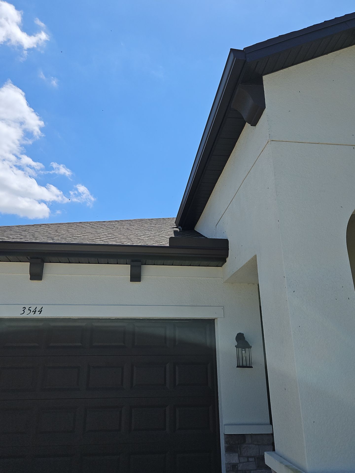 K-Style Seamless Gutter Installation using bronze gutters in Sarasota FL by Gutter Professors
