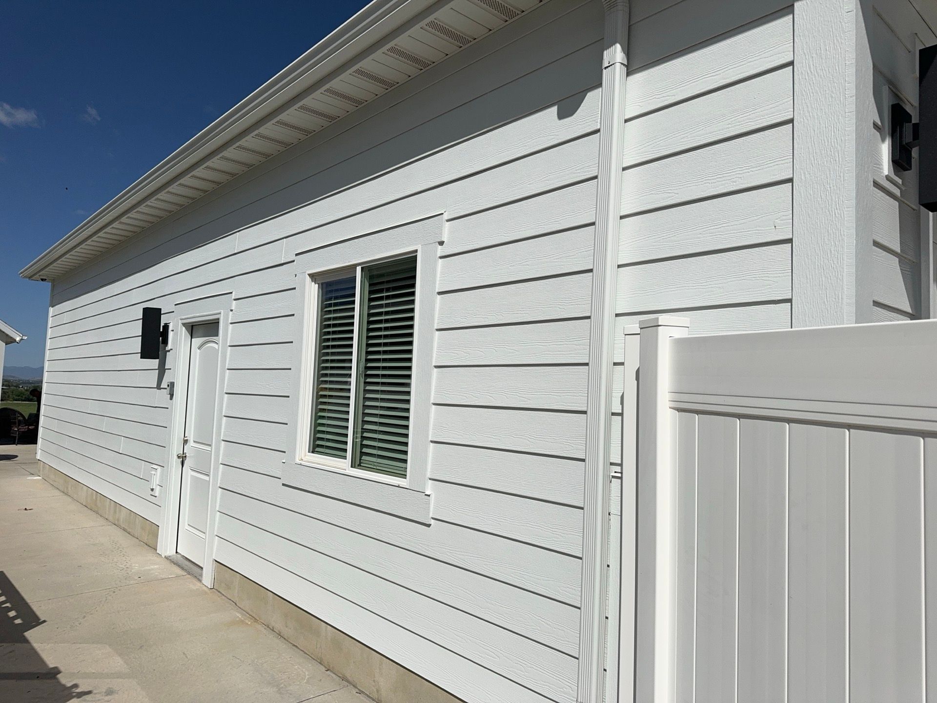Spanish Fork | Crisp Hardie Replacement & Custom Columns | Arctic White by Ideal Siding Utah