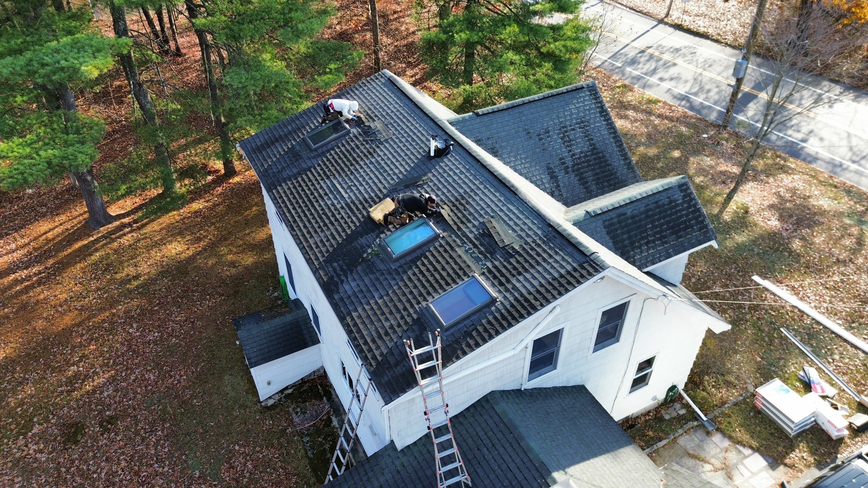 Chelmsford Triple Skylight Leak Repair with Fascia & Shingle Restoration by Mighty Dog Roofing of Greater Middlesex County