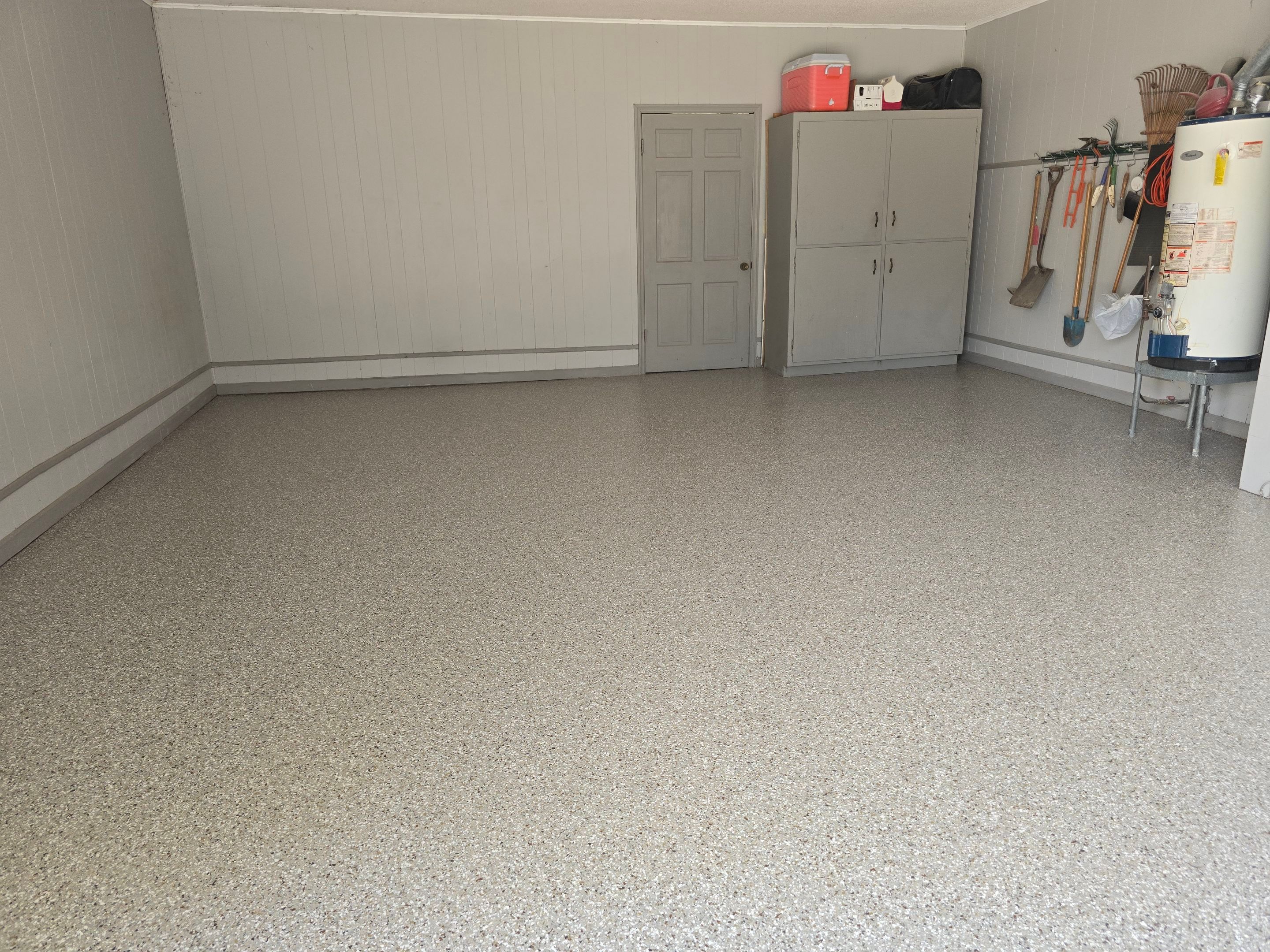 Front Porch & Garage Using Creekbed by Elite Floor Solutions