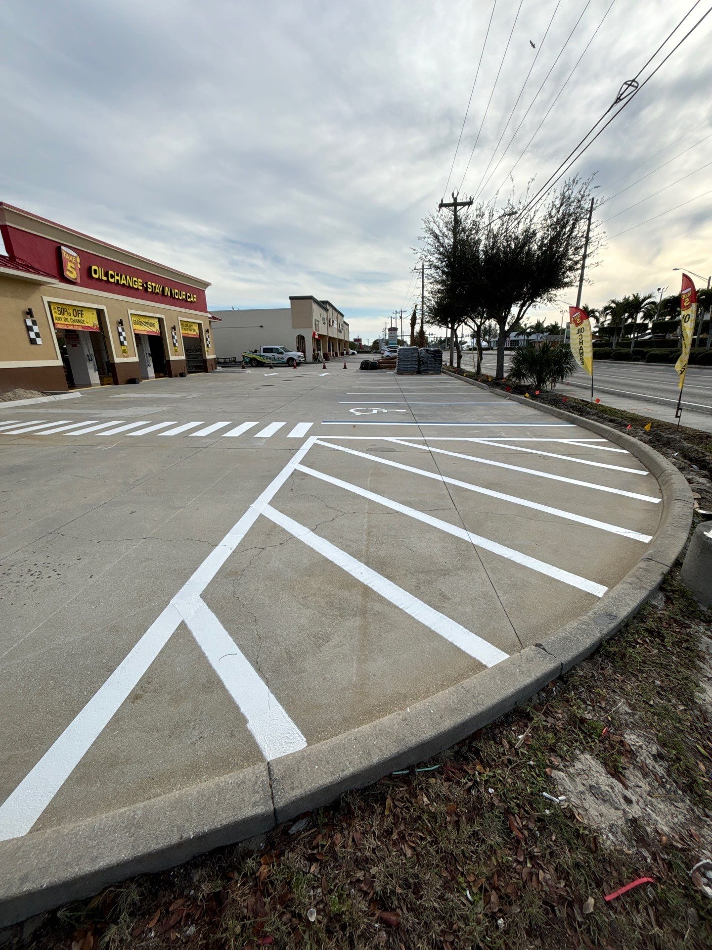New Layout Line Striping at Take 5 Oil Change by Everline Coatings & Services - Southwest FL