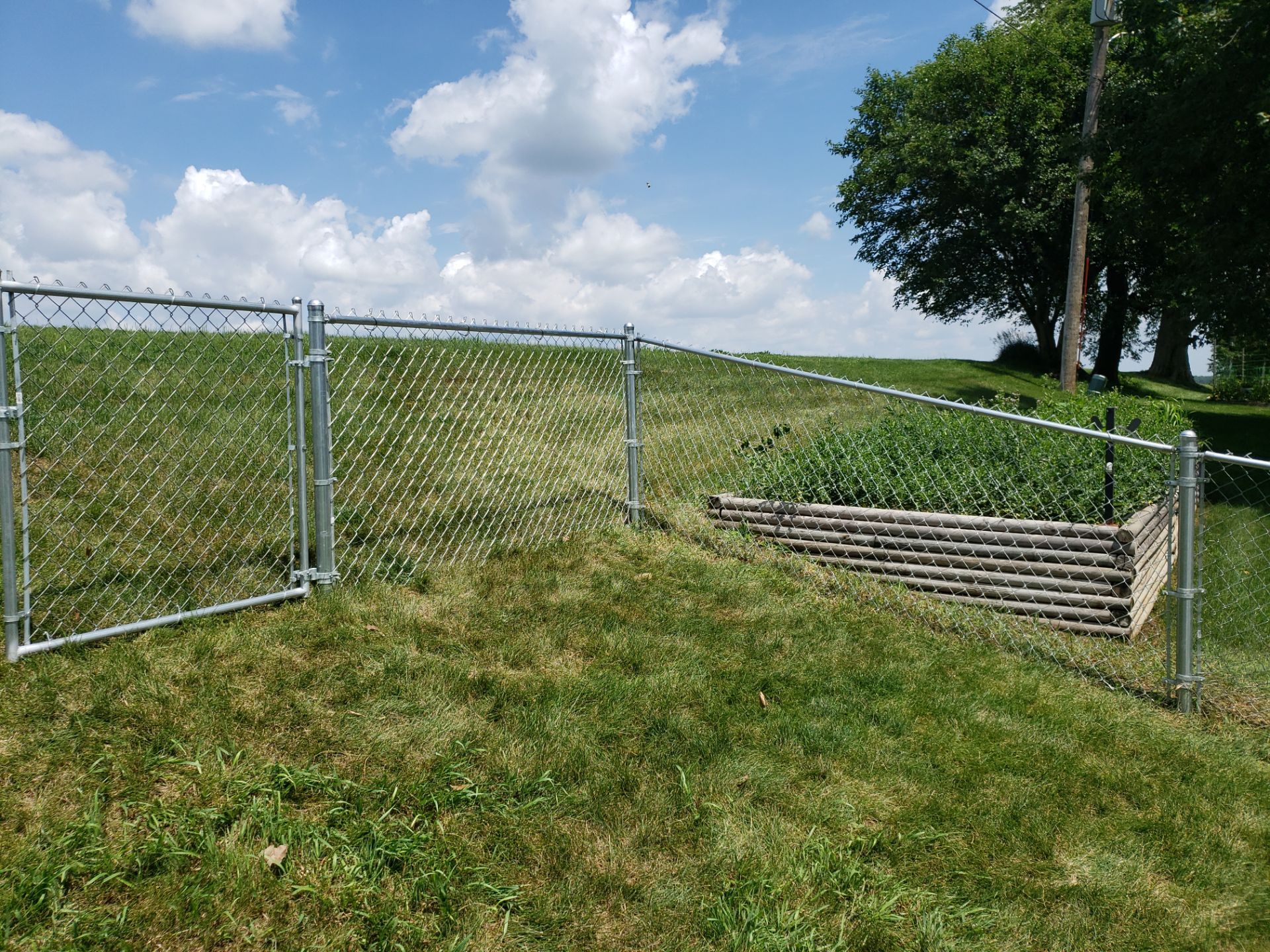 Hudson Residential Chain Link Fence and Pedestrian Gate Installation by Perfect Picket Fence and Stain