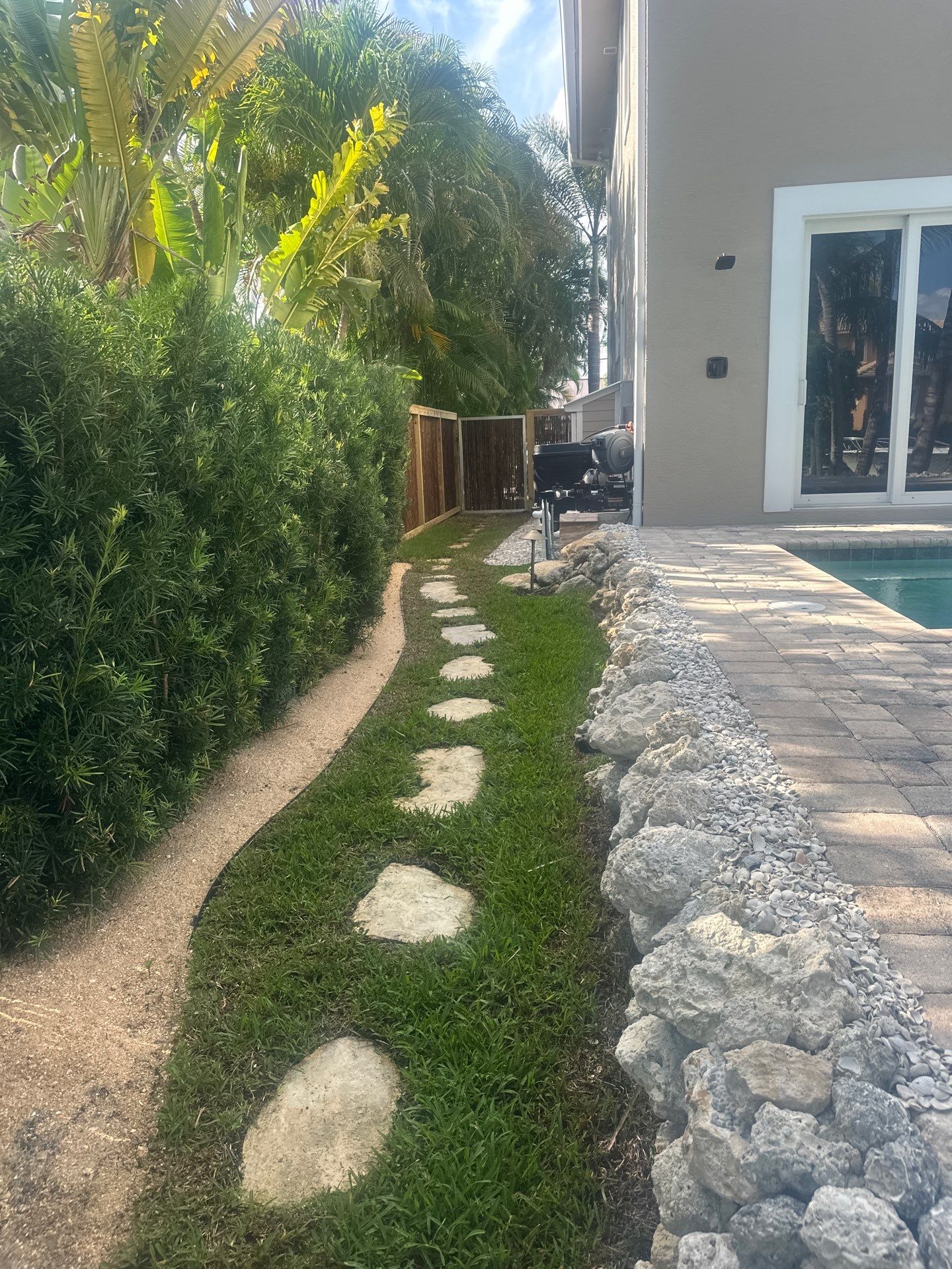 “Tropical Oasis Transformation in Palm City” by Alpha Zeta Enterprises Inc