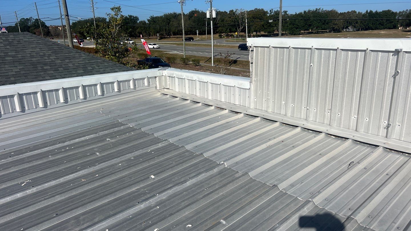 Silicone Roof Restoration for Commercial Metal Building in Lutz by CES Roofing
