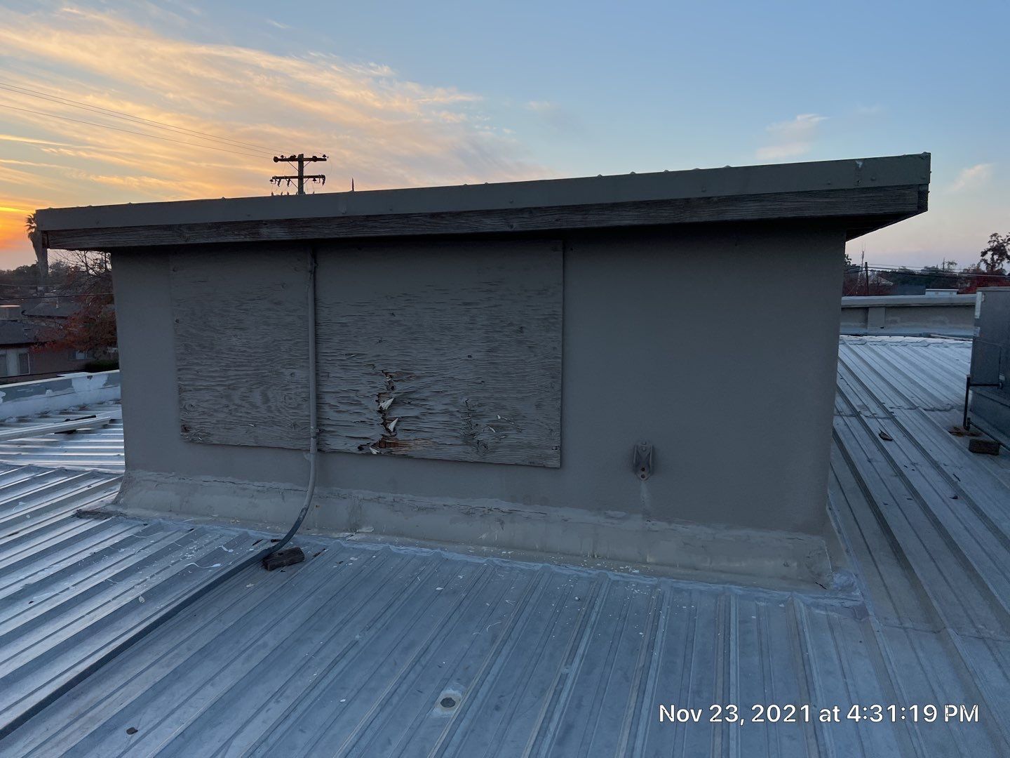 Metal roof restoration on commercial roof using Conklin Benchmark/ PUMA XL acrylic coatings over metal and foam by Straight Edge Roofing Inc