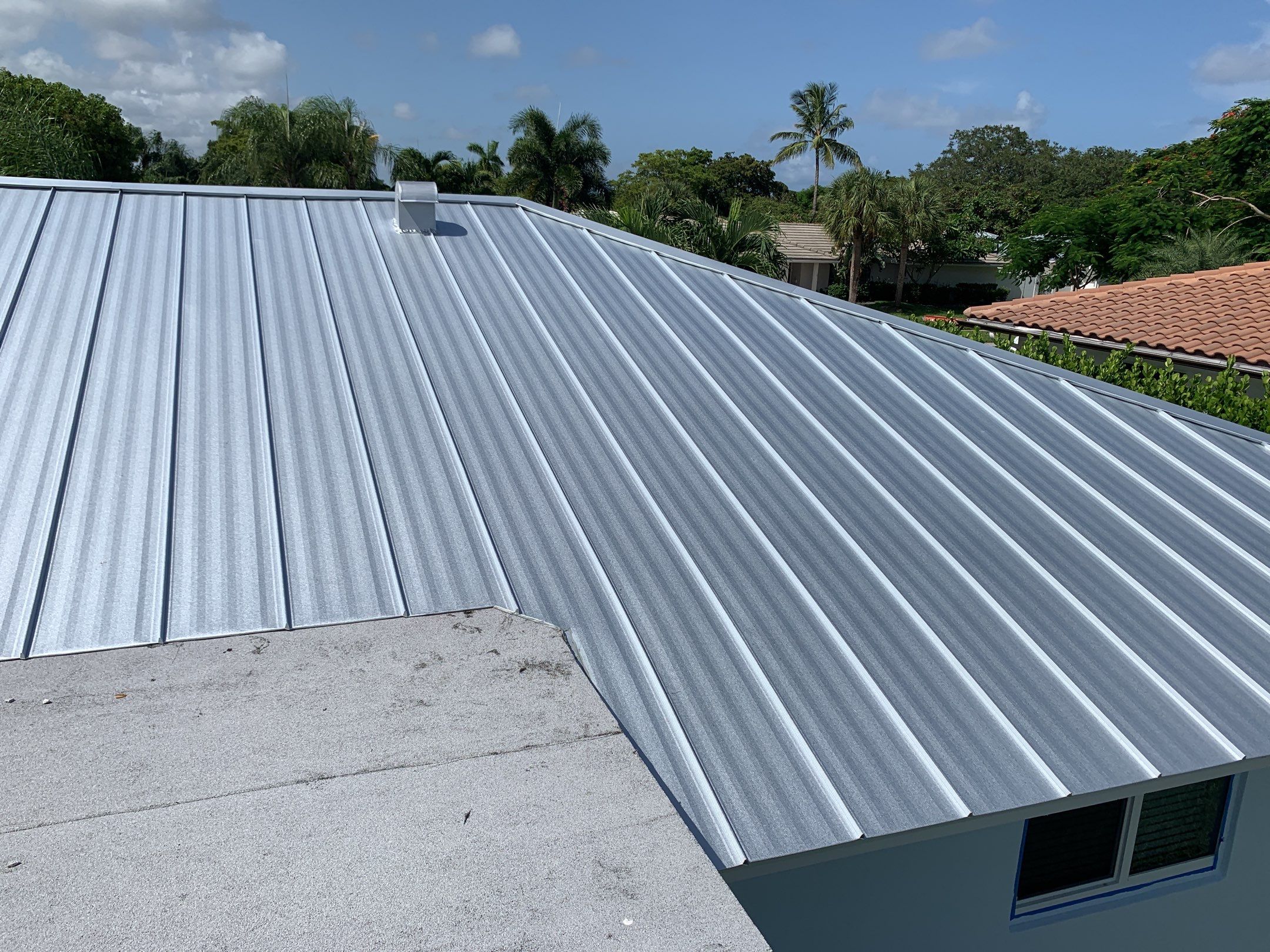 Residential Roofing Installation using 1" Nail strip metal roof by BLUES BROTHERS ROOFING