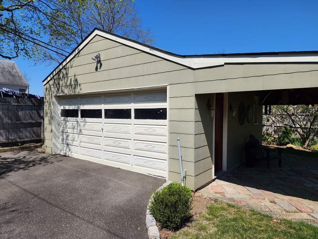 "Levittown Beauty Unveiled: A Siding Transformation Story" by Nisi Home Improvement