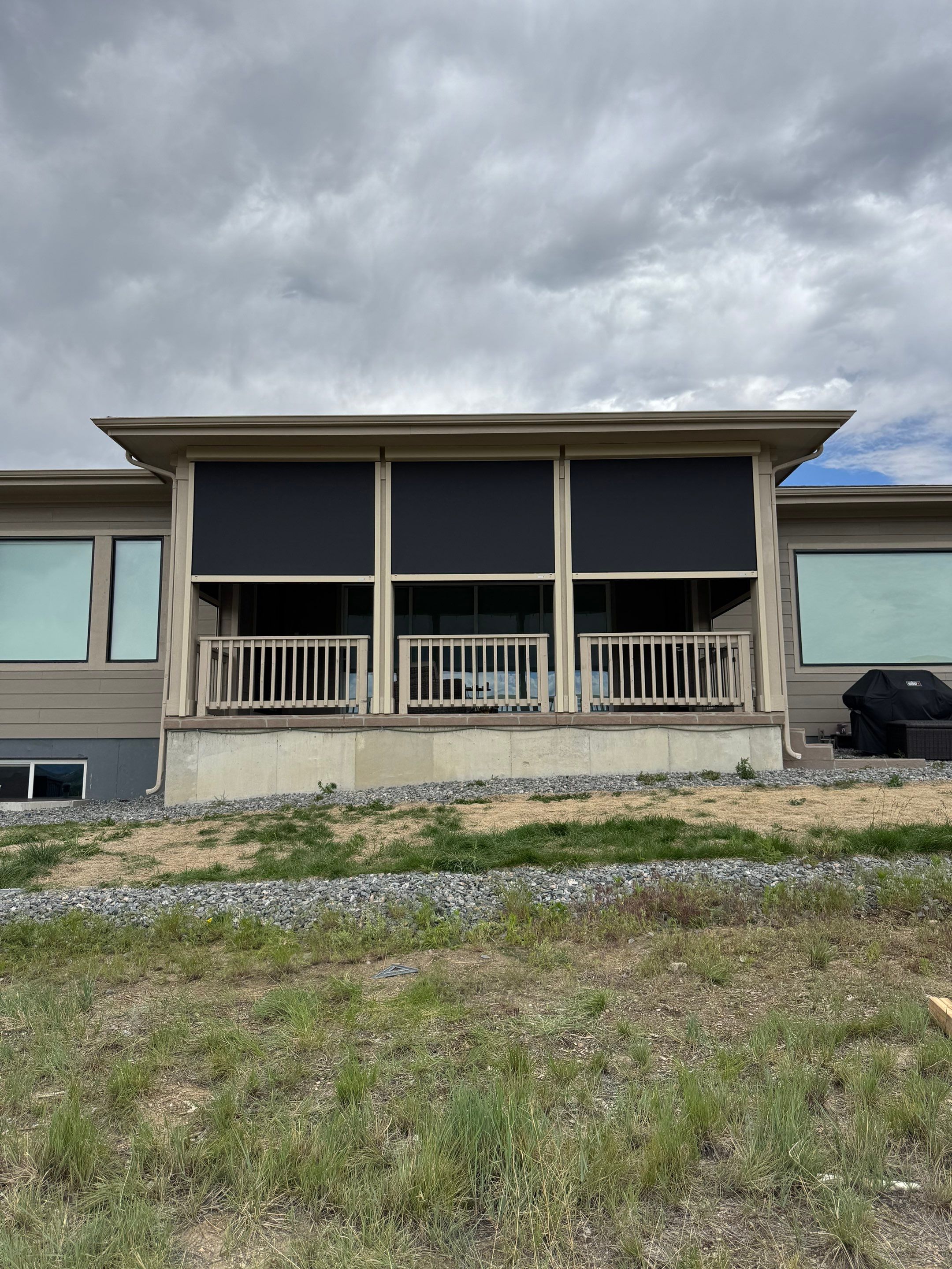 Exterior MagnaTrack Solar Screen Installation on Castle Rock Covered Patio by Outdoor Solutions Colorado