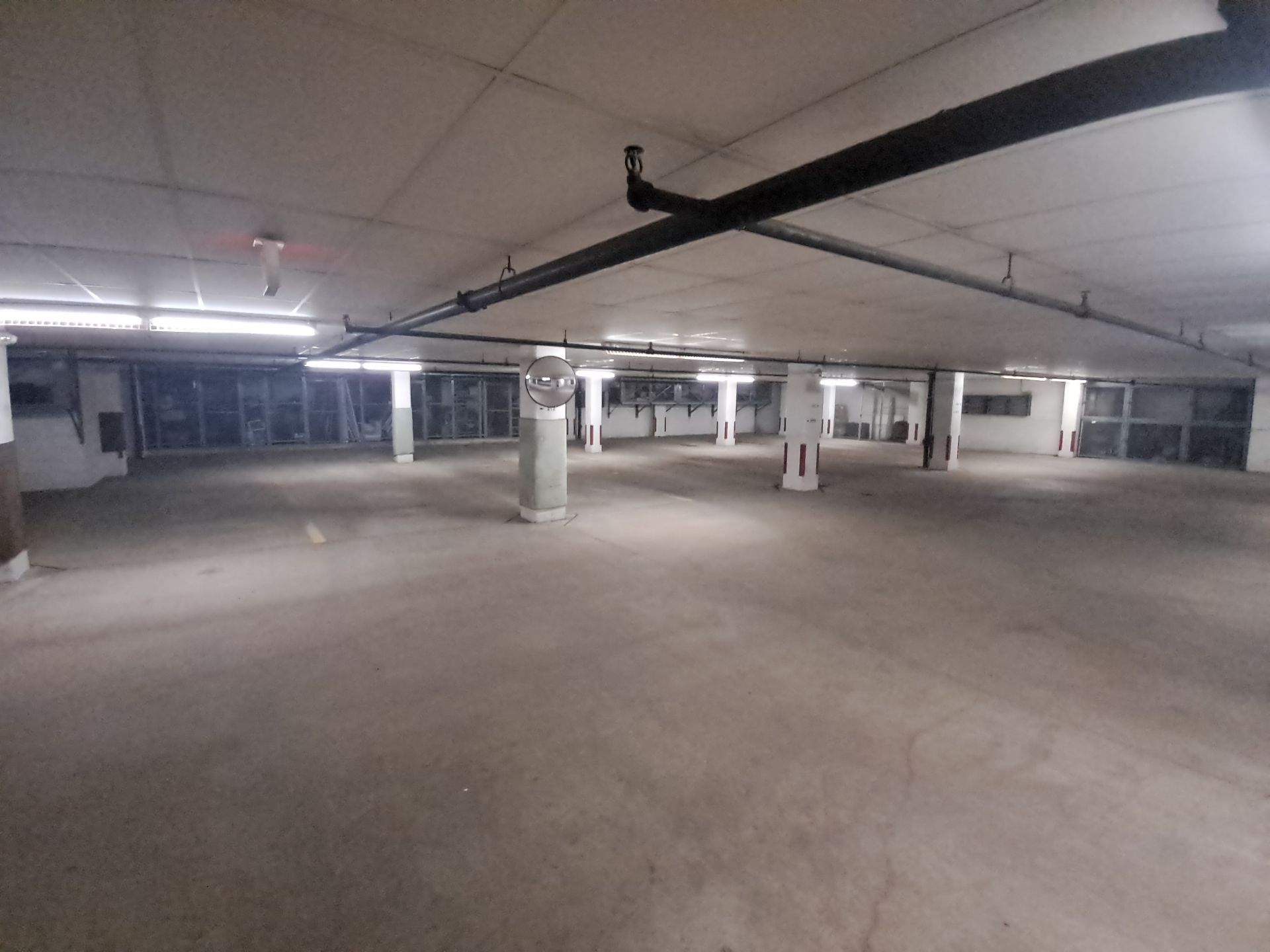 Parking Garage Sweeping & Concrete Deep Cleaning by Northern Power Washing LLC.