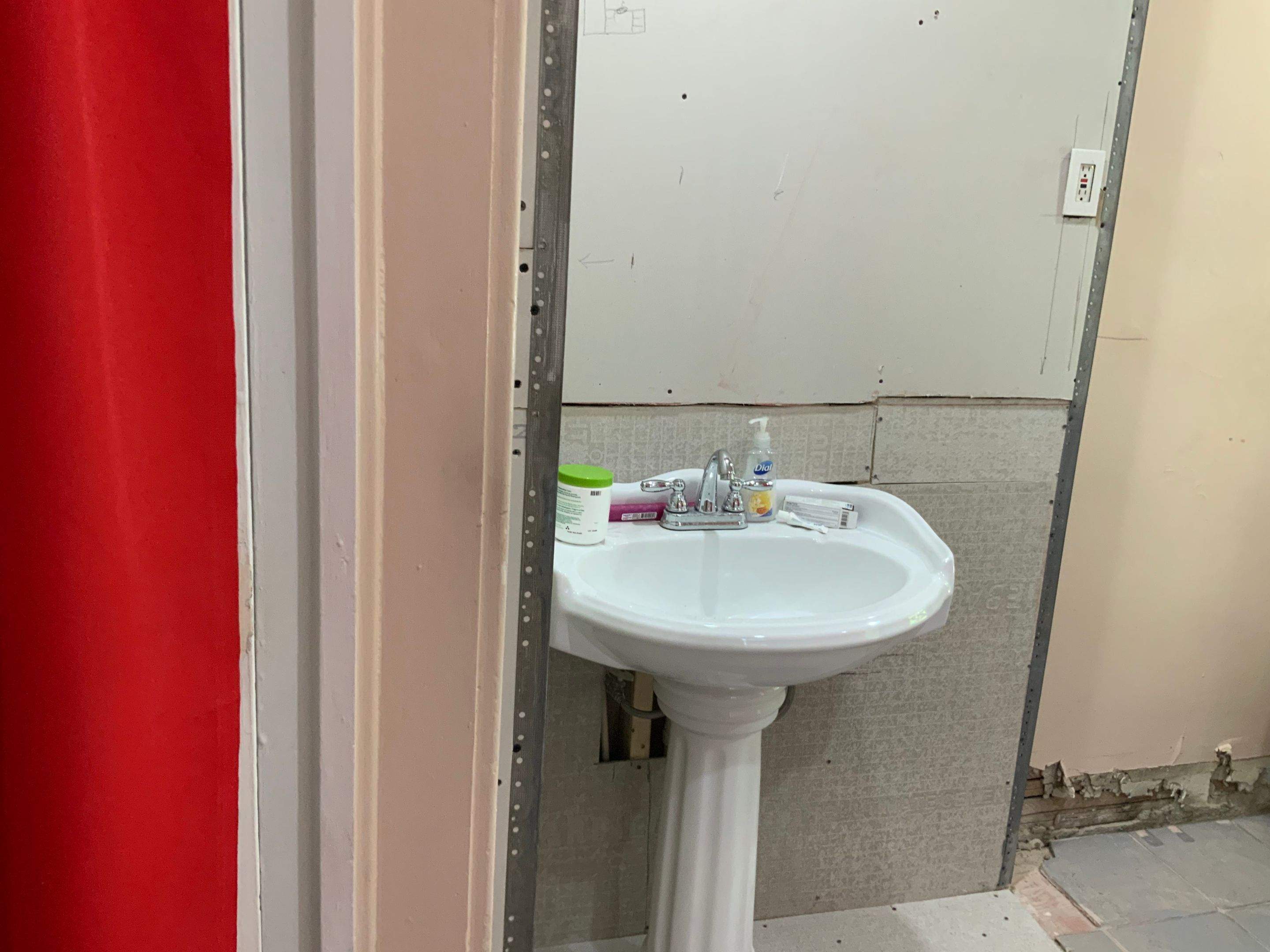 Bathroom Remodel using New Bathroom Tile and Tube by Alpha Design Services